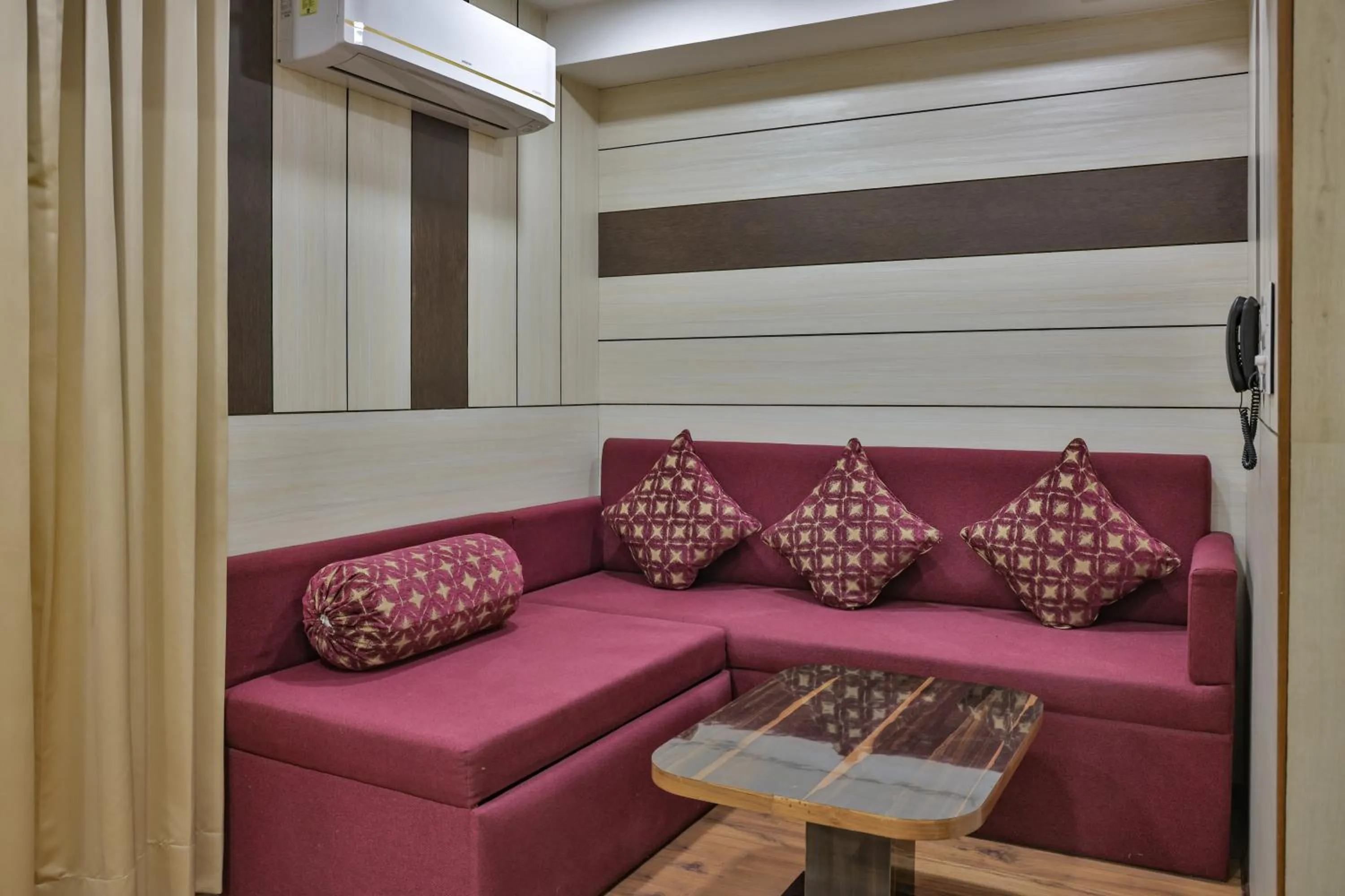 Living room in Hotel Cama