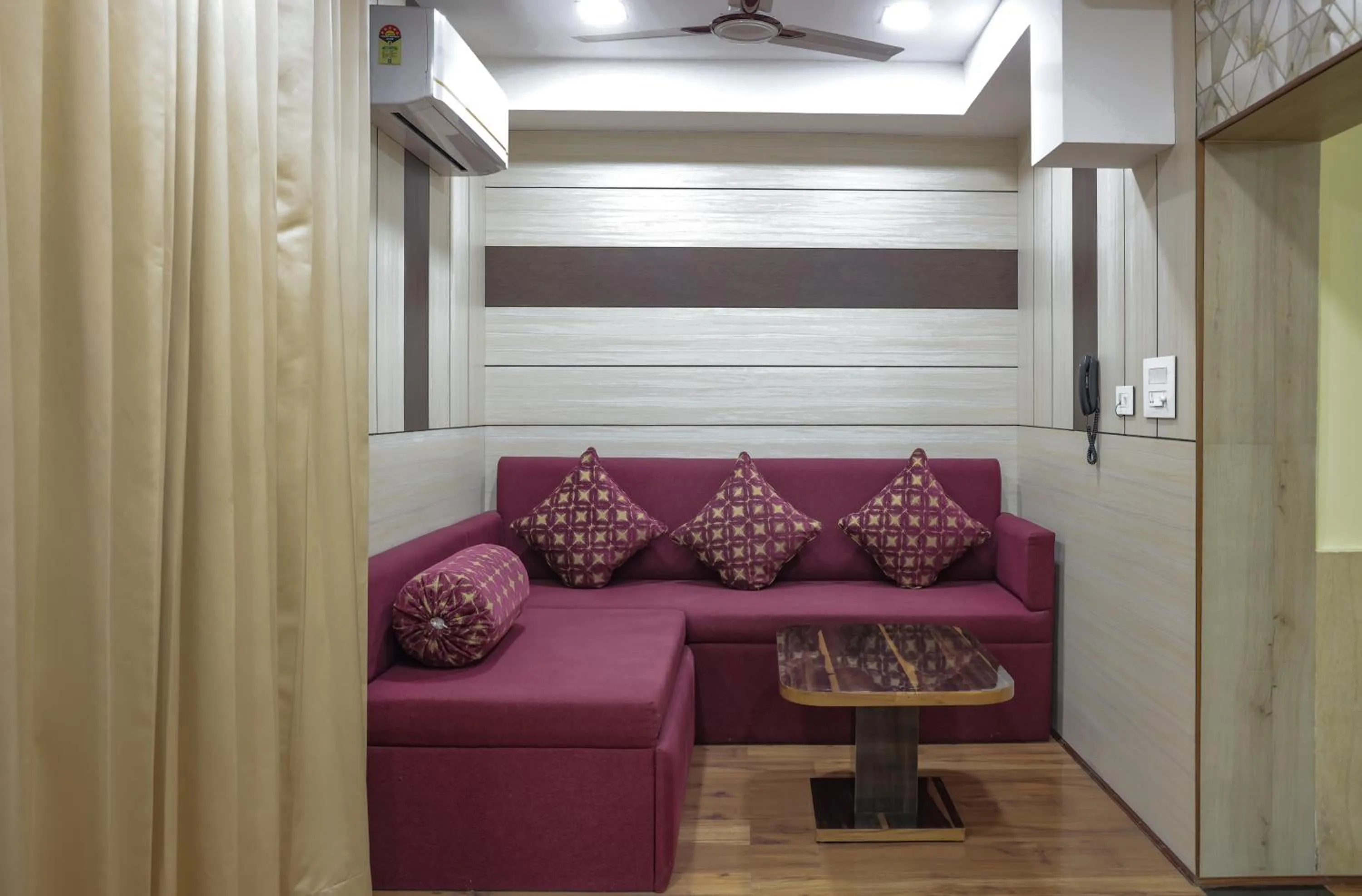 Living room in Hotel Cama