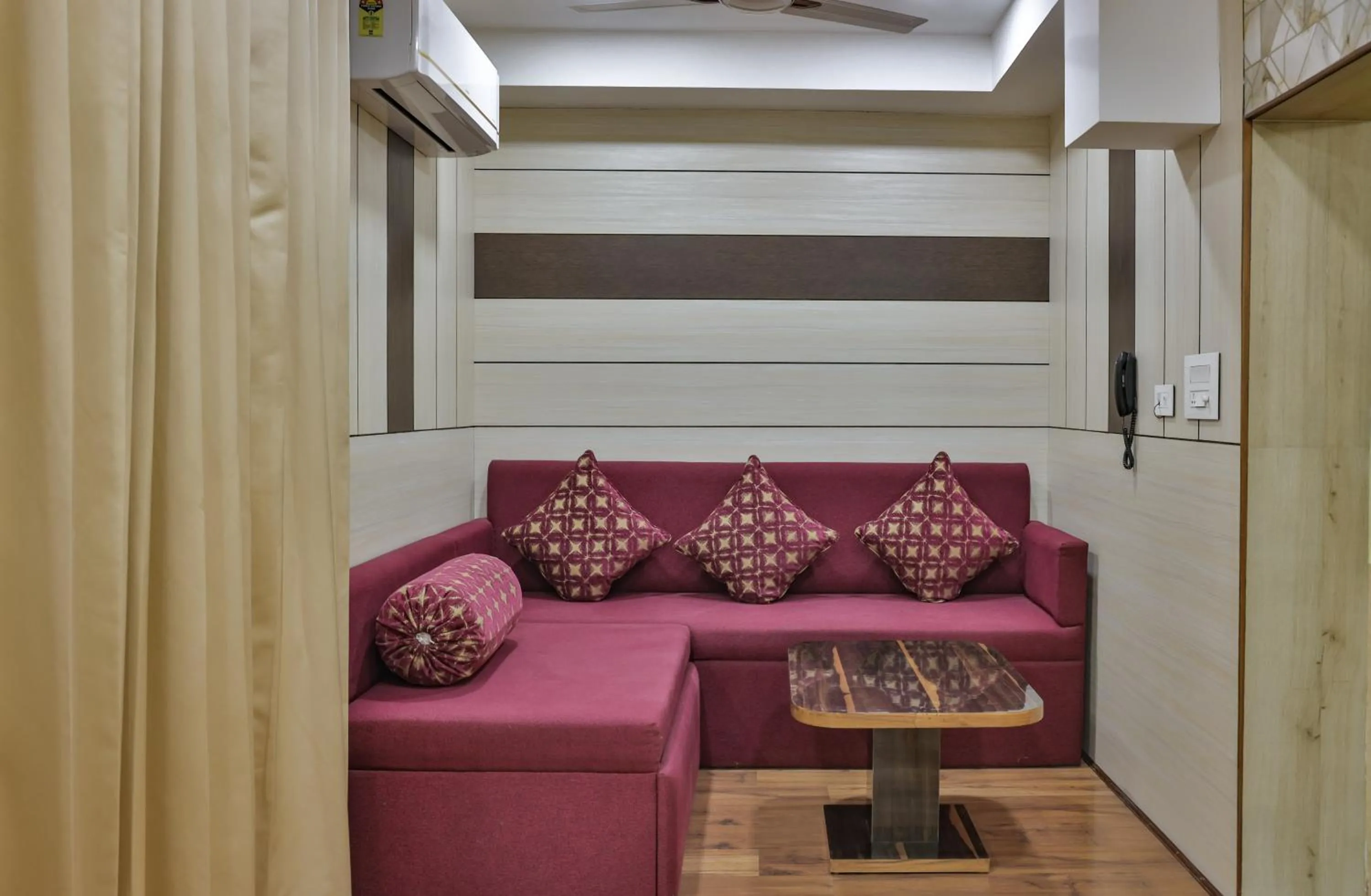 Living room in Hotel Cama