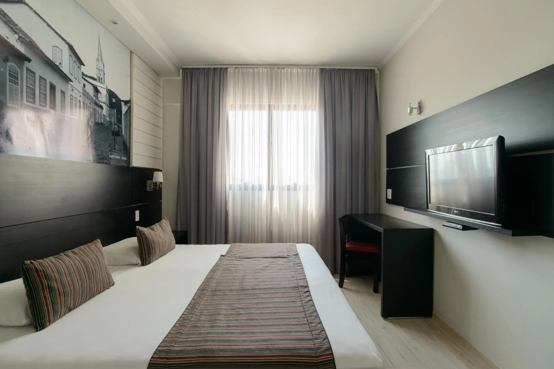 Bed in Faro Hotel Taubaté