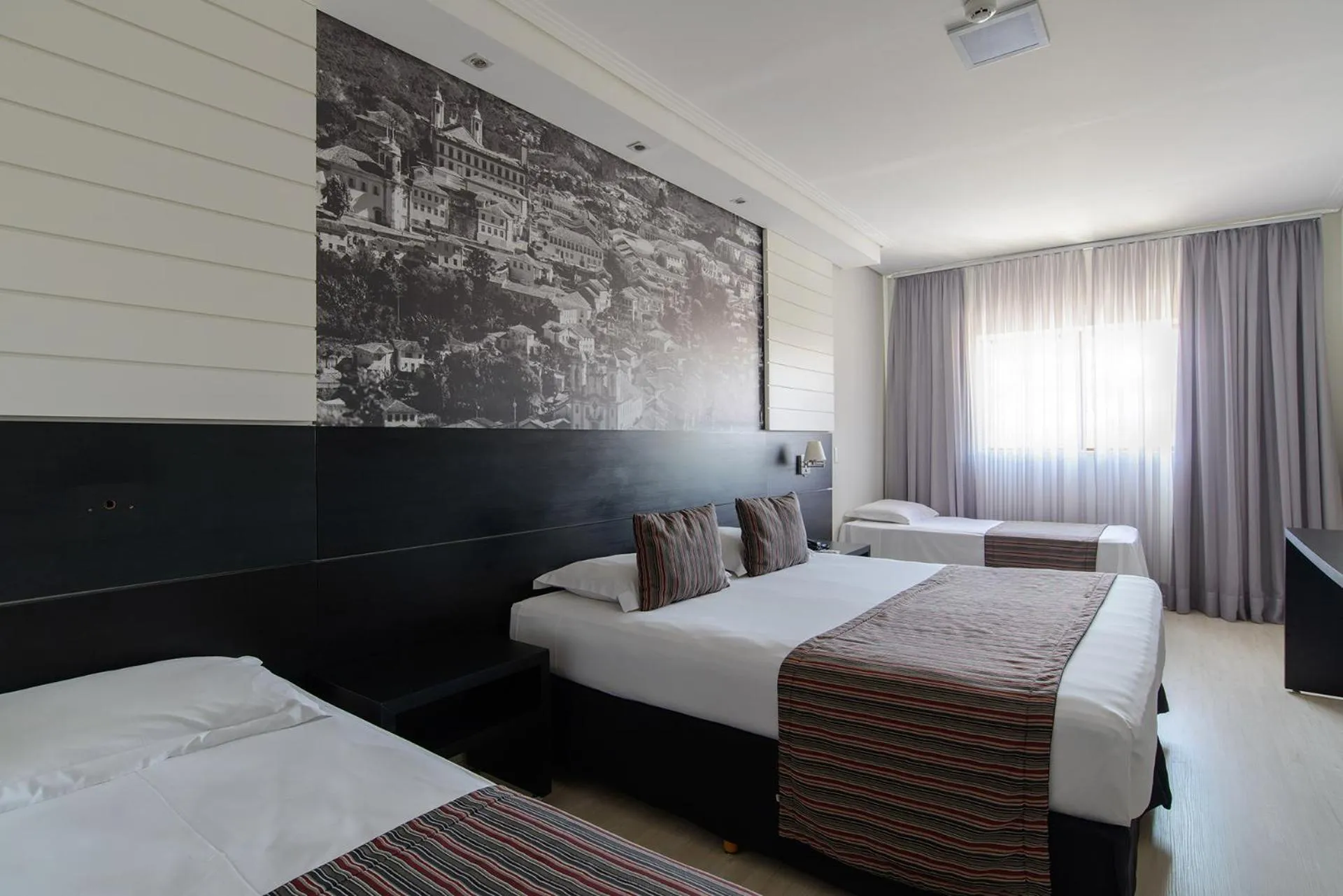 Bed in Faro Hotel Taubaté