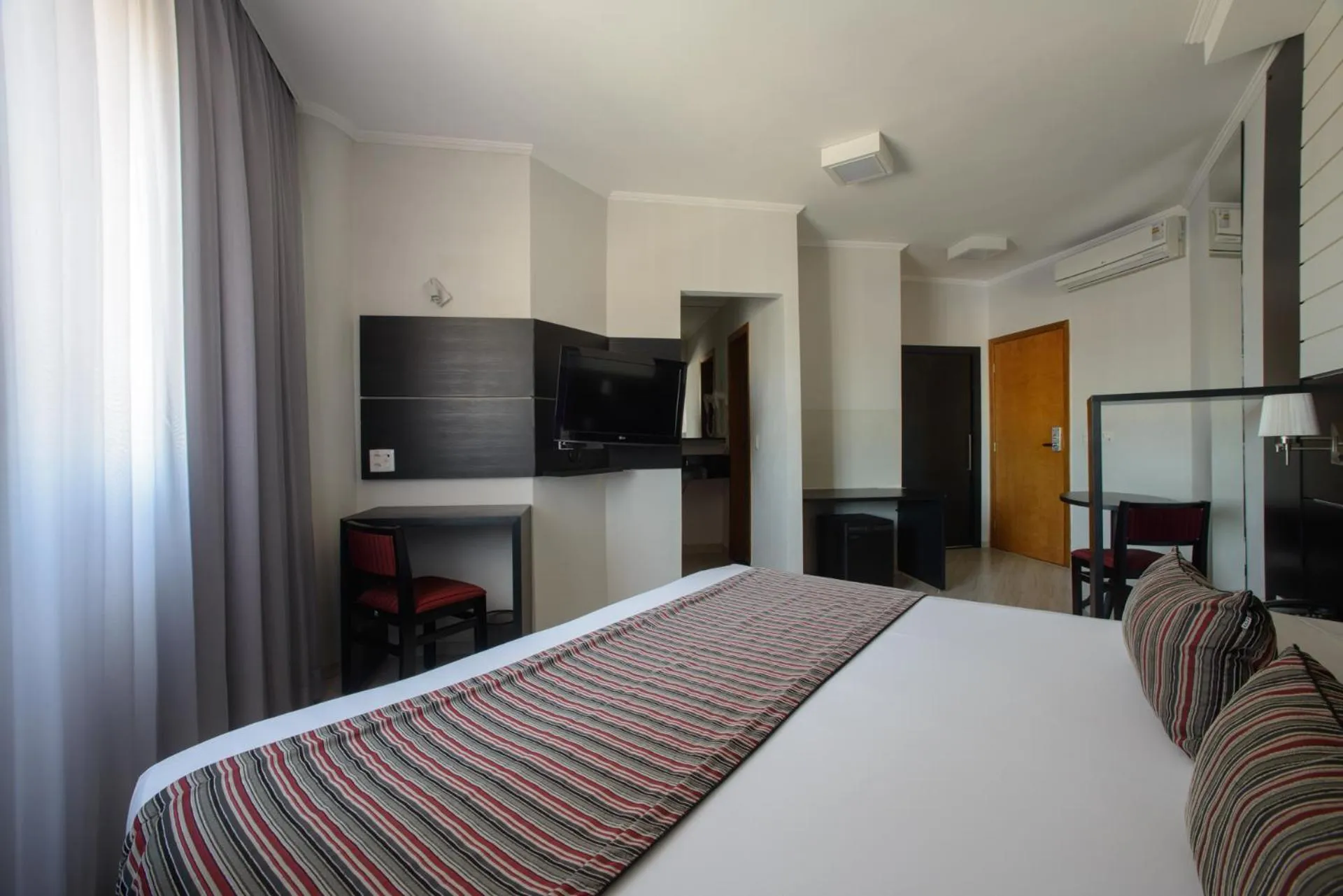 Bed in Faro Hotel Taubaté