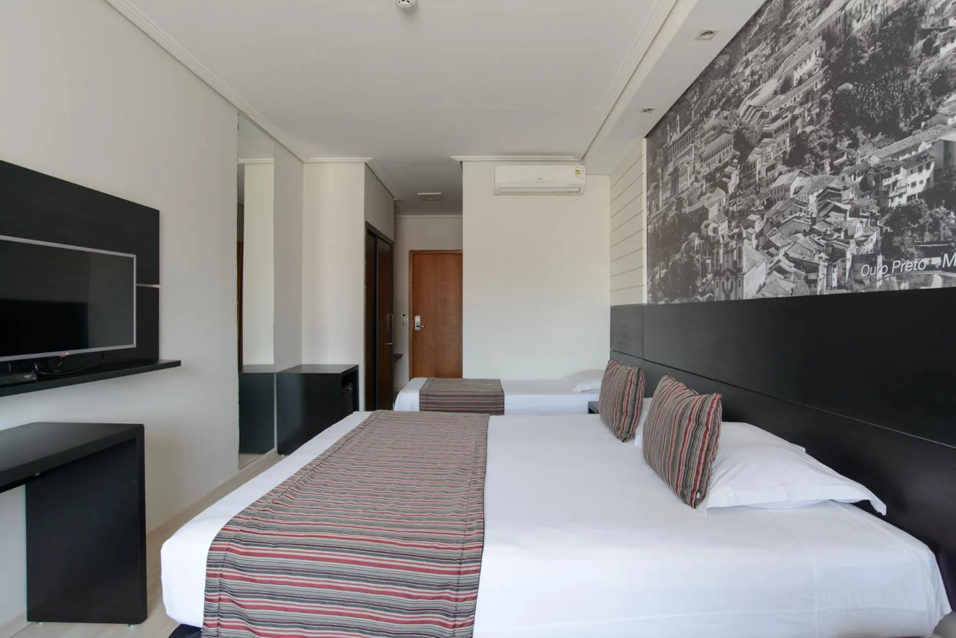 Bed in Faro Hotel Taubaté