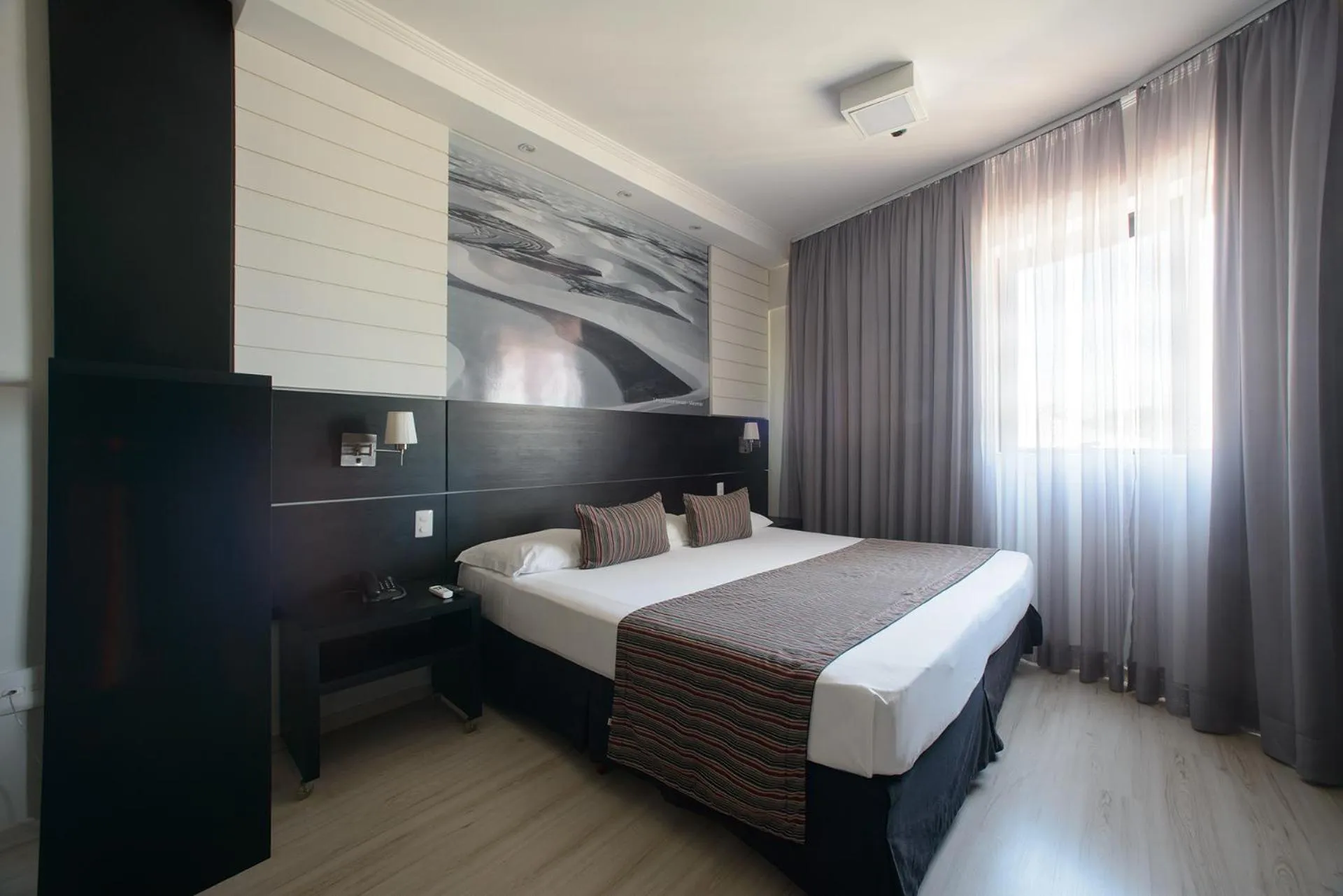 Bed in Faro Hotel Taubaté