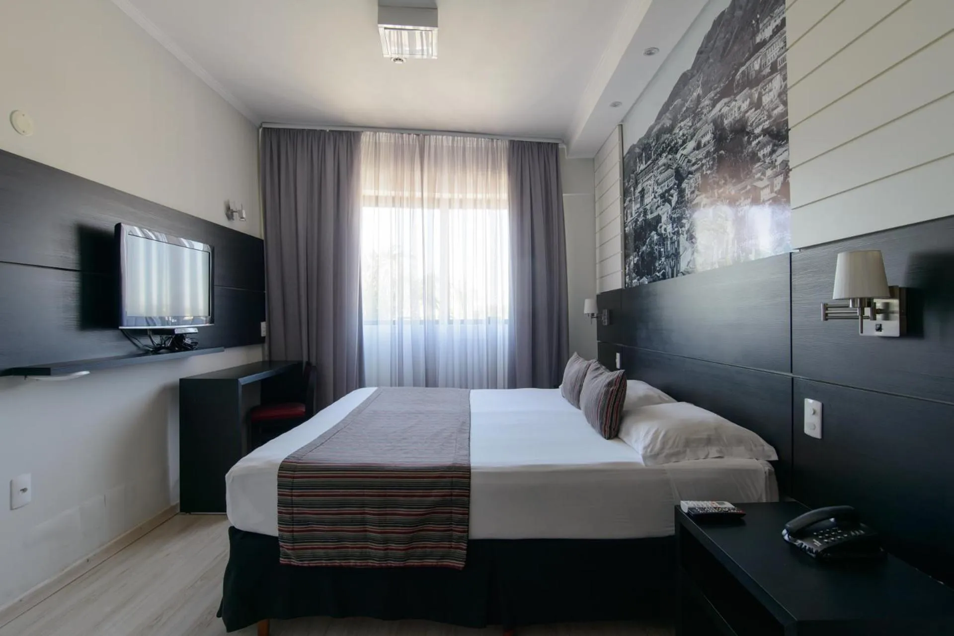 Bed in Faro Hotel Taubaté