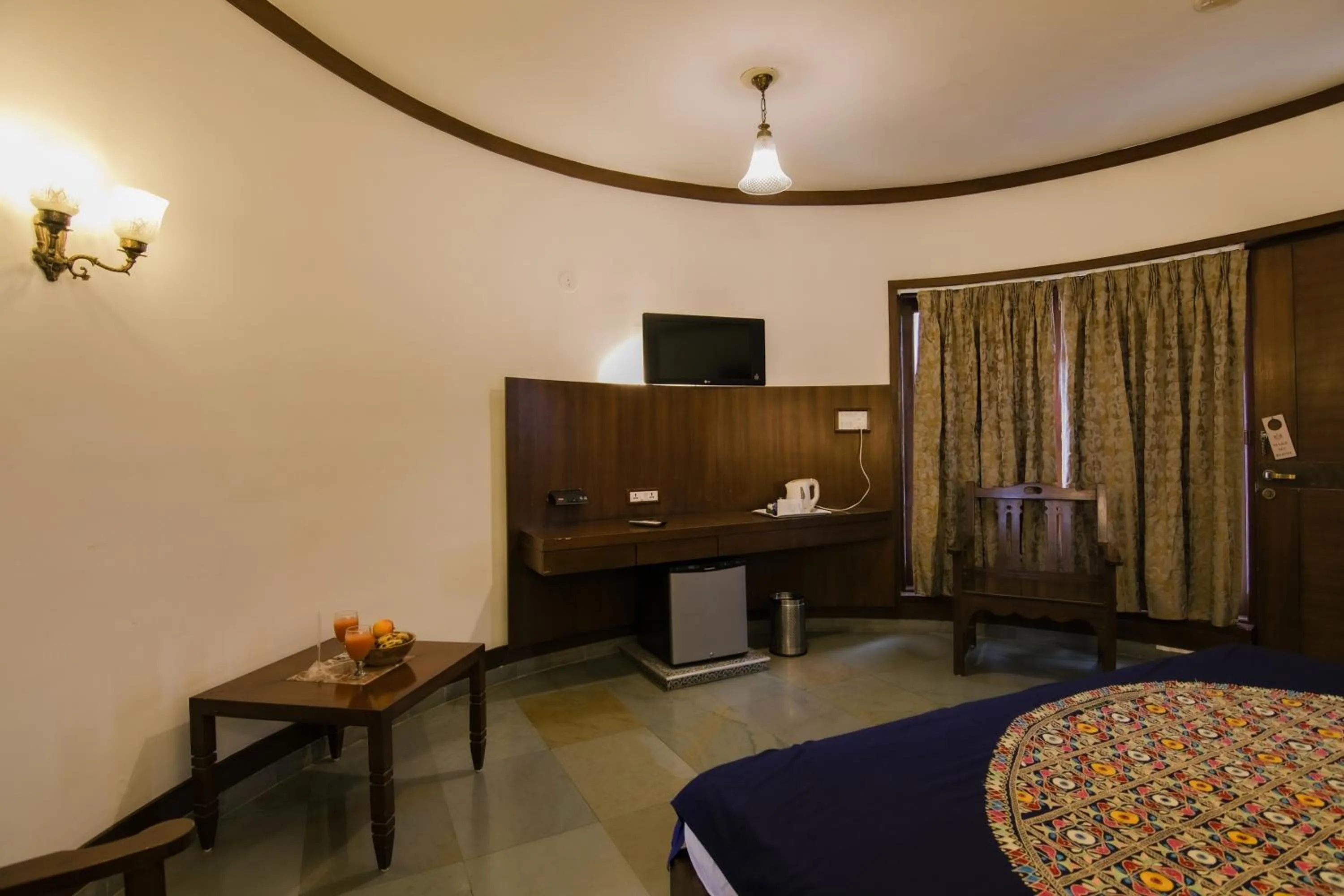 Bed in Heritage Khirasara Palace