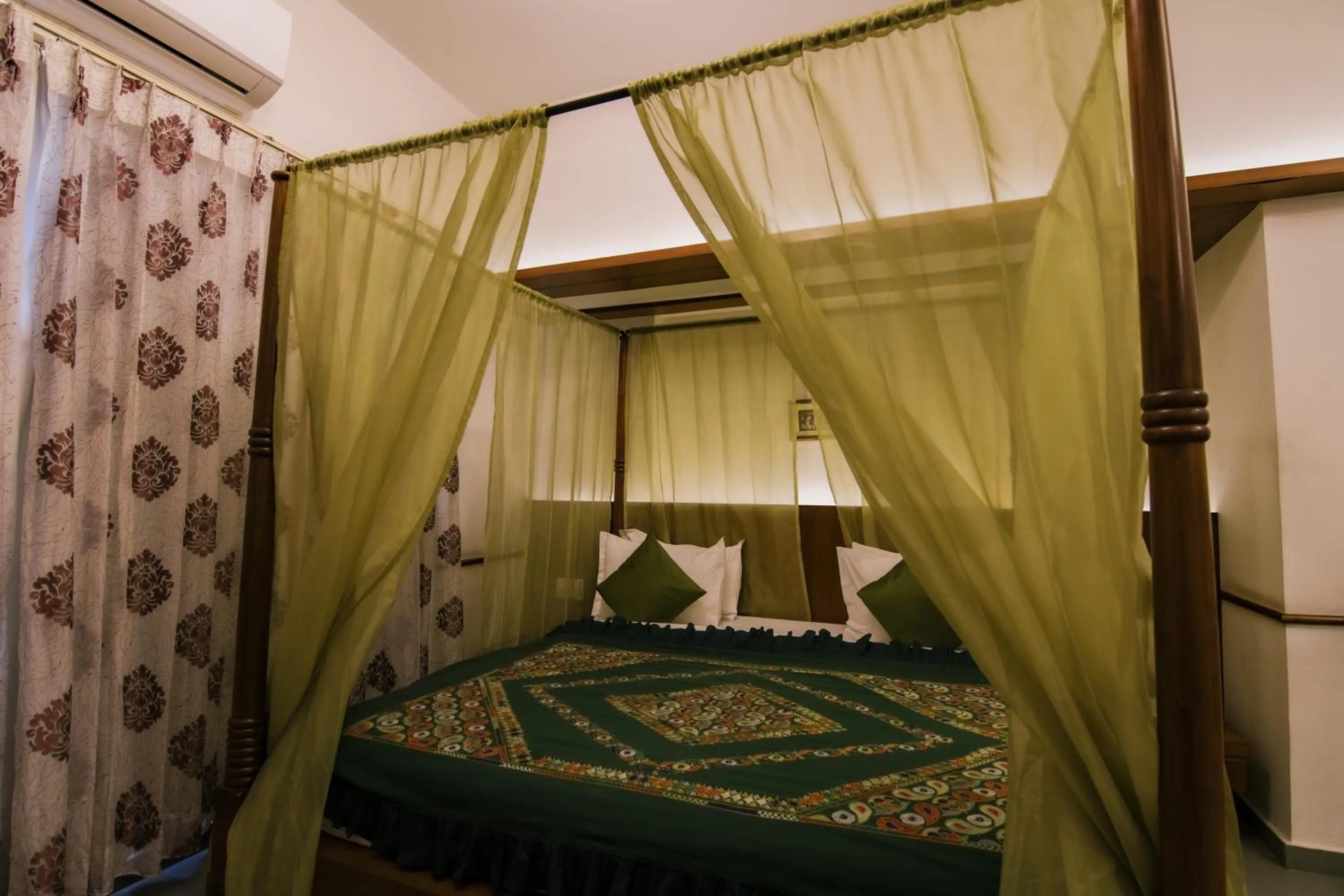 Bed in Heritage Khirasara Palace