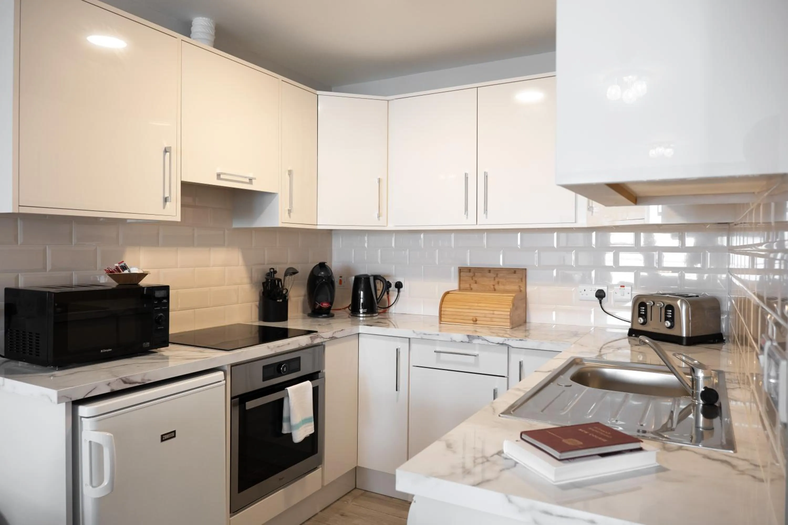 Kitchen or kitchenette in Galway Bay Sea View Apartments