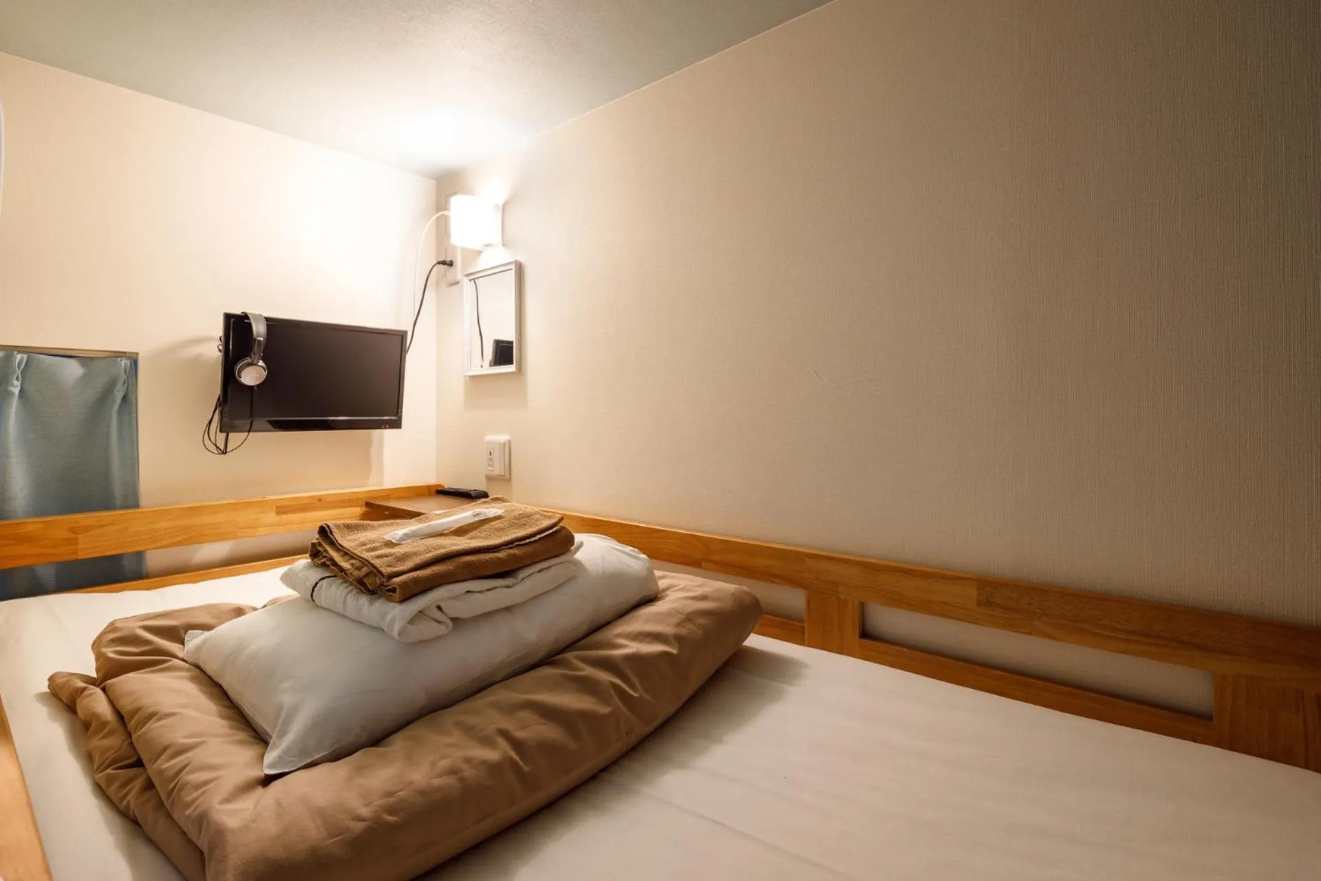 Bed in Hotel Owl Tokyo Shinbashi