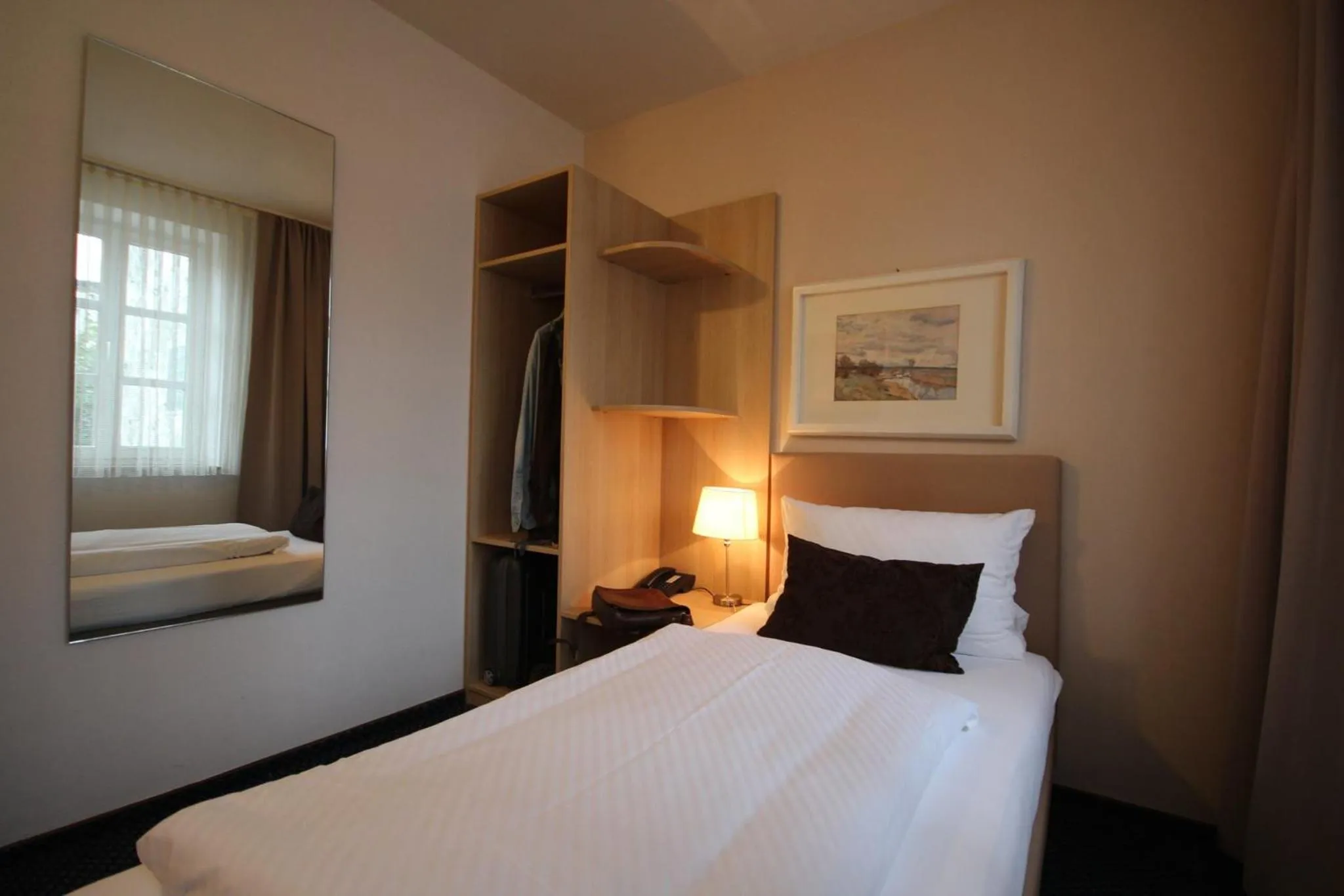 Bed in ONNO Boutique Hotel & Apartments