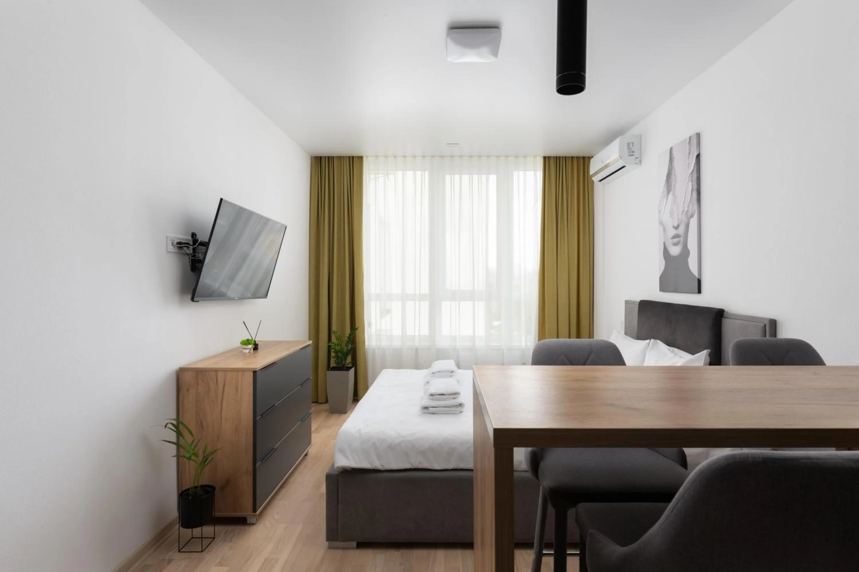 Communal lounge/ TV room, Bed in Nyvky Residence