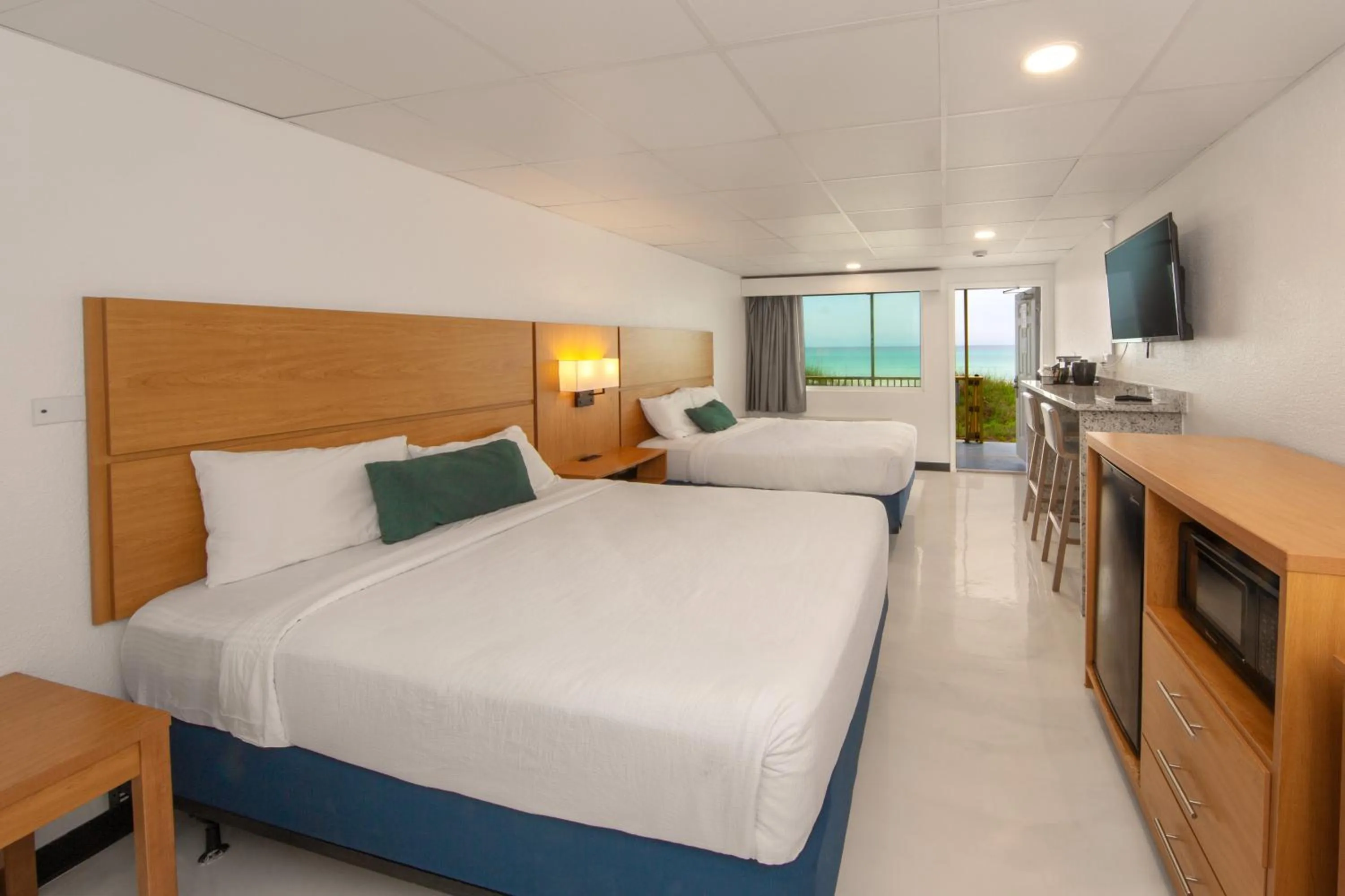 Bed in Chateau Beachfront Hotel, a By the Sea Resort