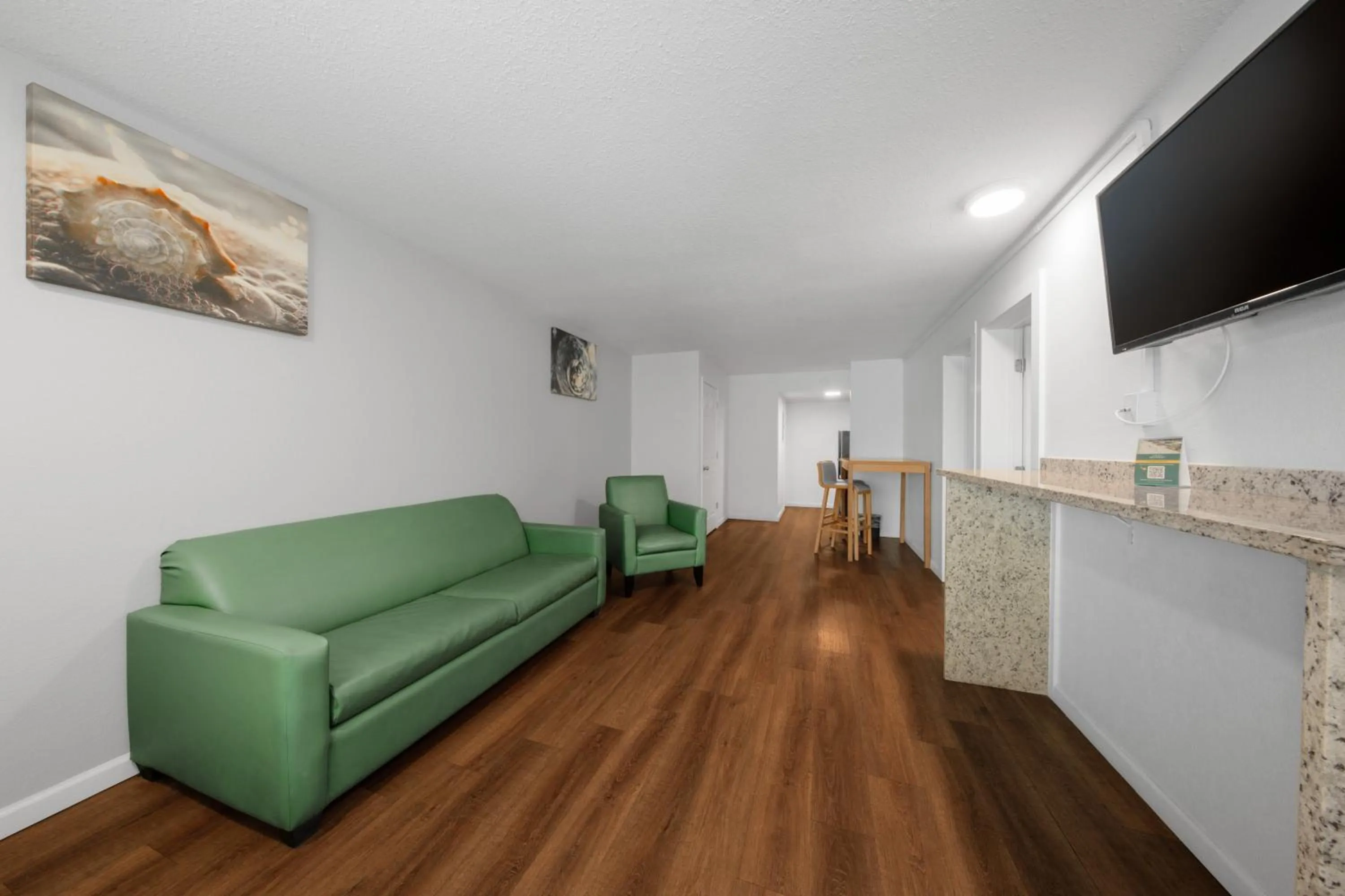 Living room in Chateau Beachfront Hotel, a By the Sea Resort