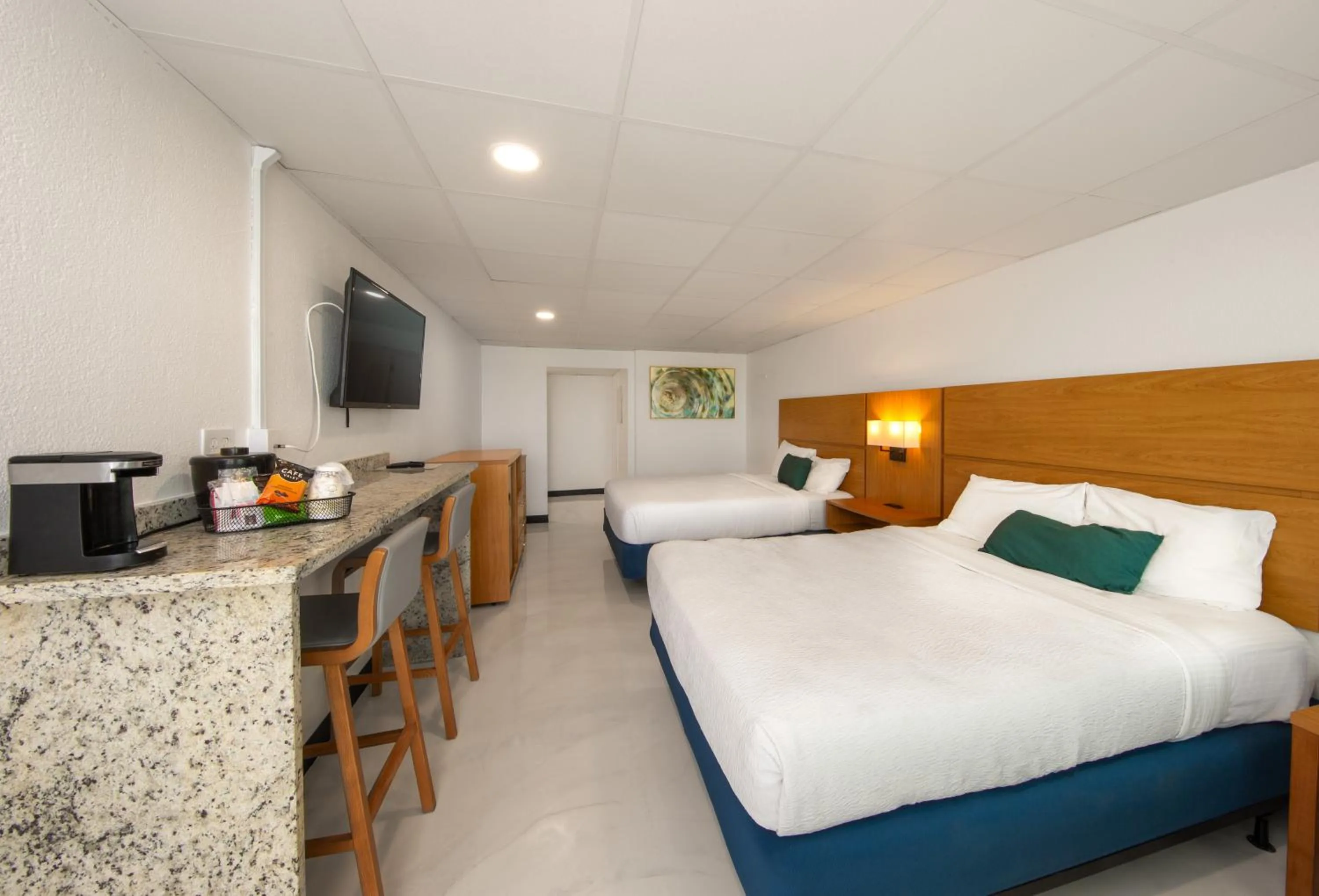 Bed in Chateau Beachfront Hotel, a By the Sea Resort