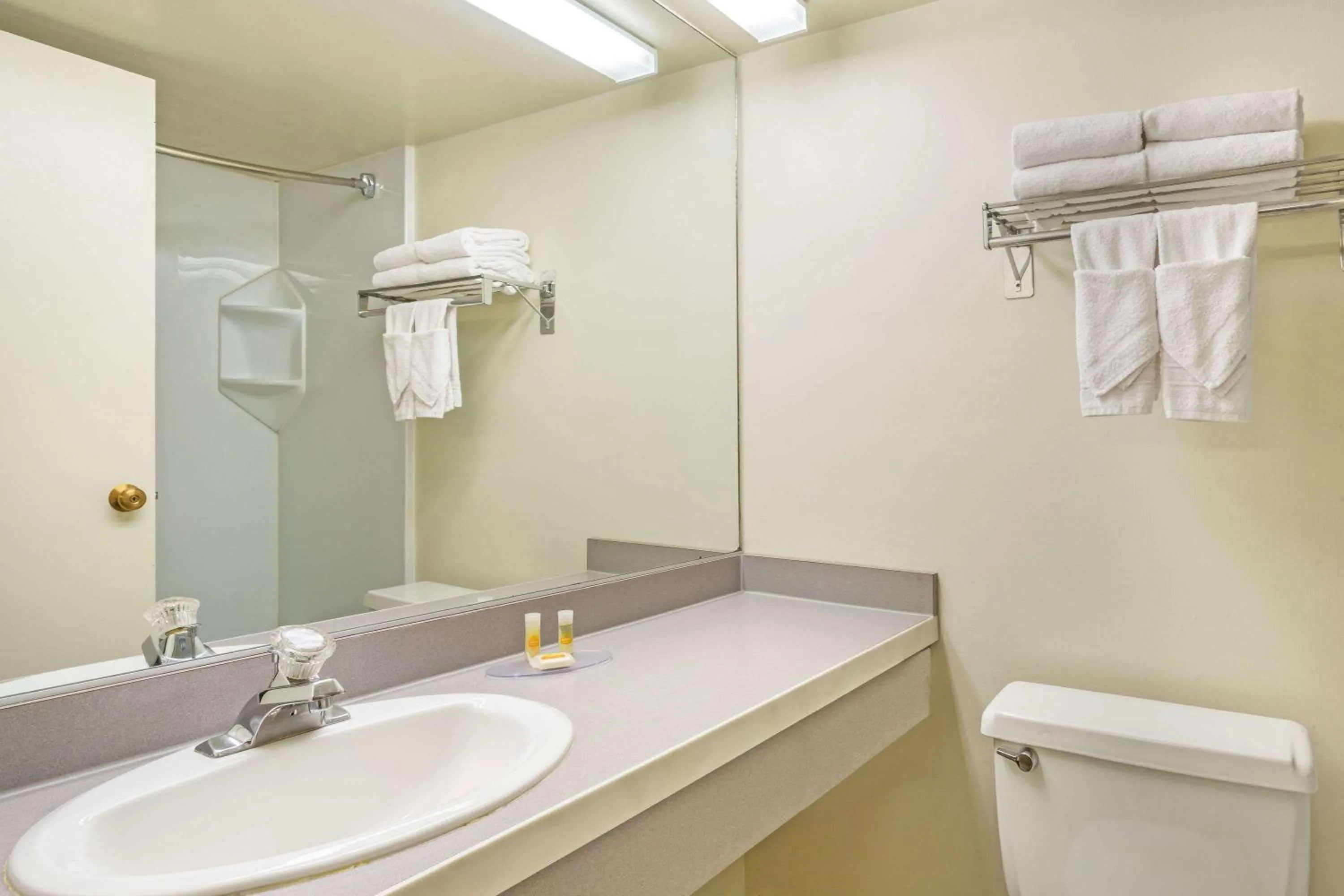 Bathroom in Days Inn & Suites by Wyndham Logan