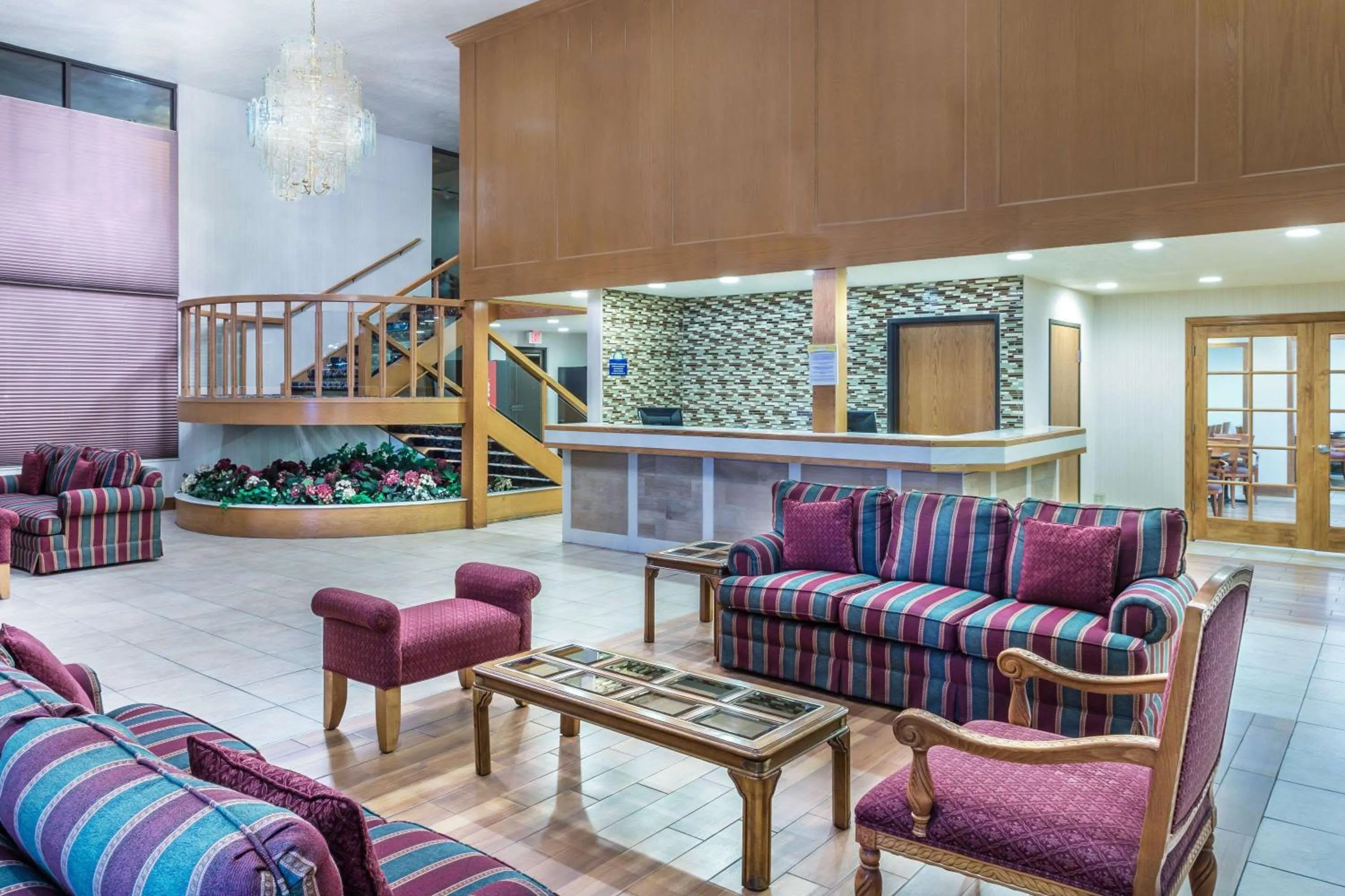 Lobby or reception in Days Inn & Suites by Wyndham Logan