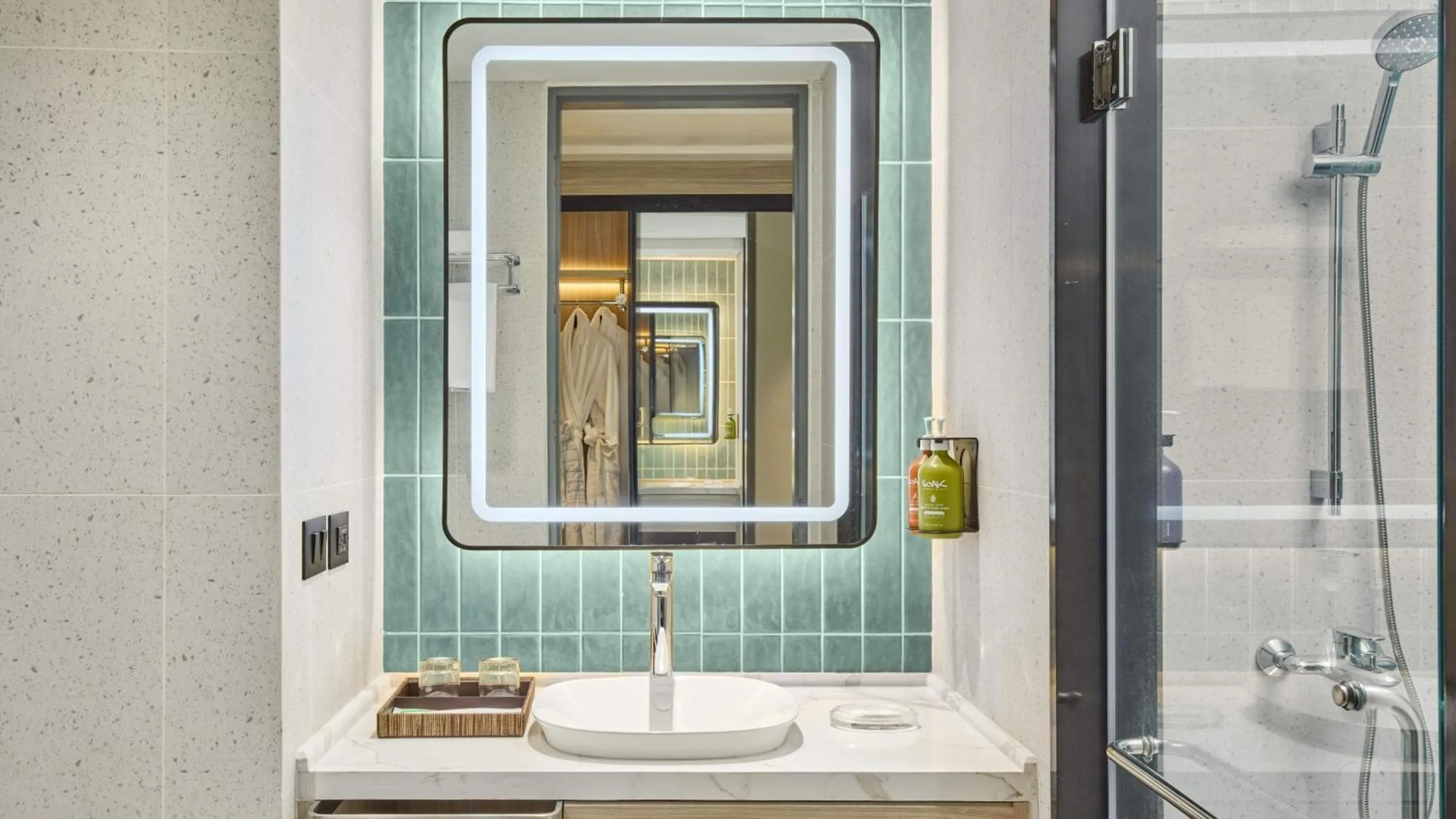 Bathroom in Holiday Inn & Suites Makati by IHG