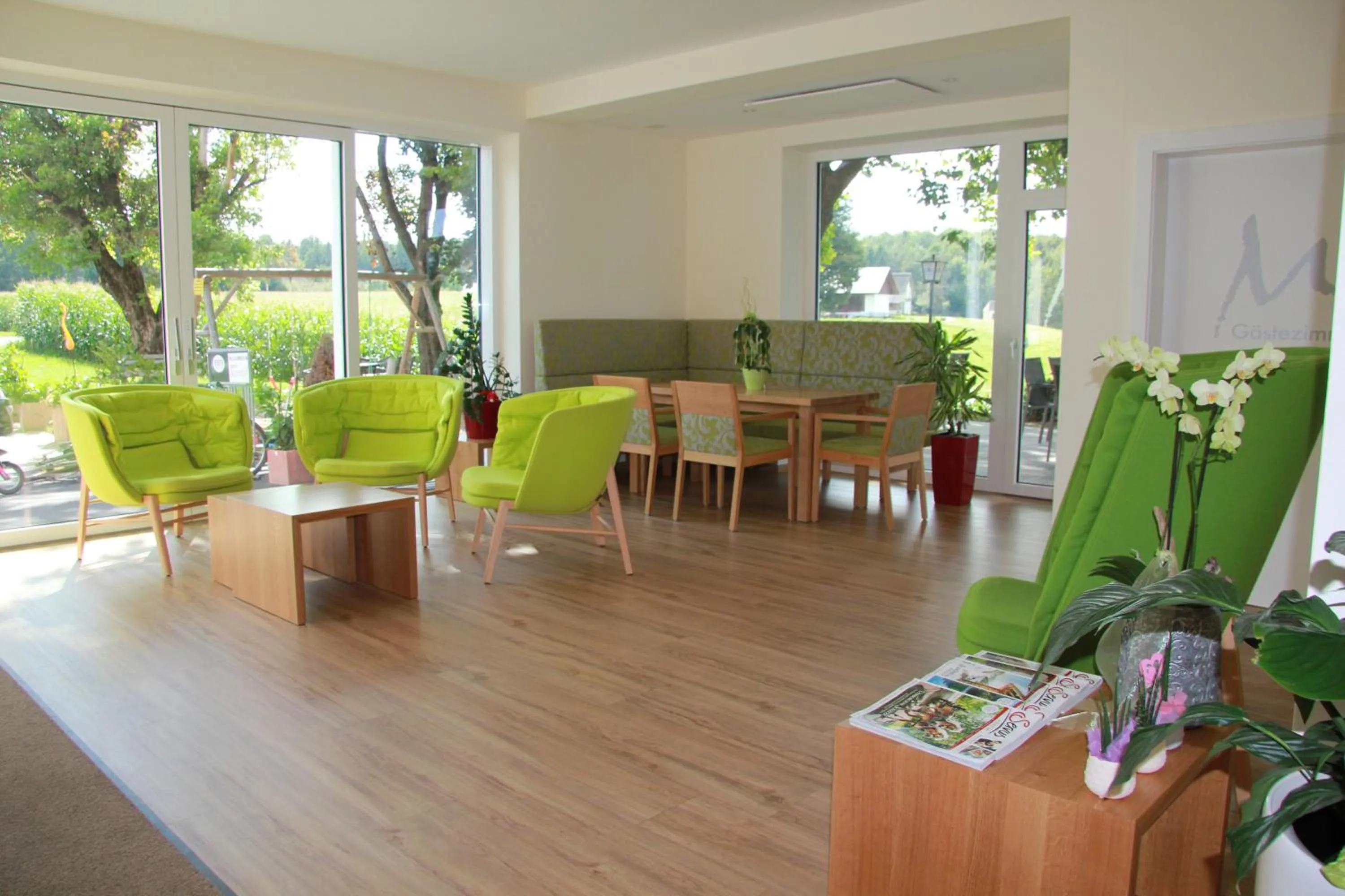 Communal lounge/ TV room in Gasthof Martinhof