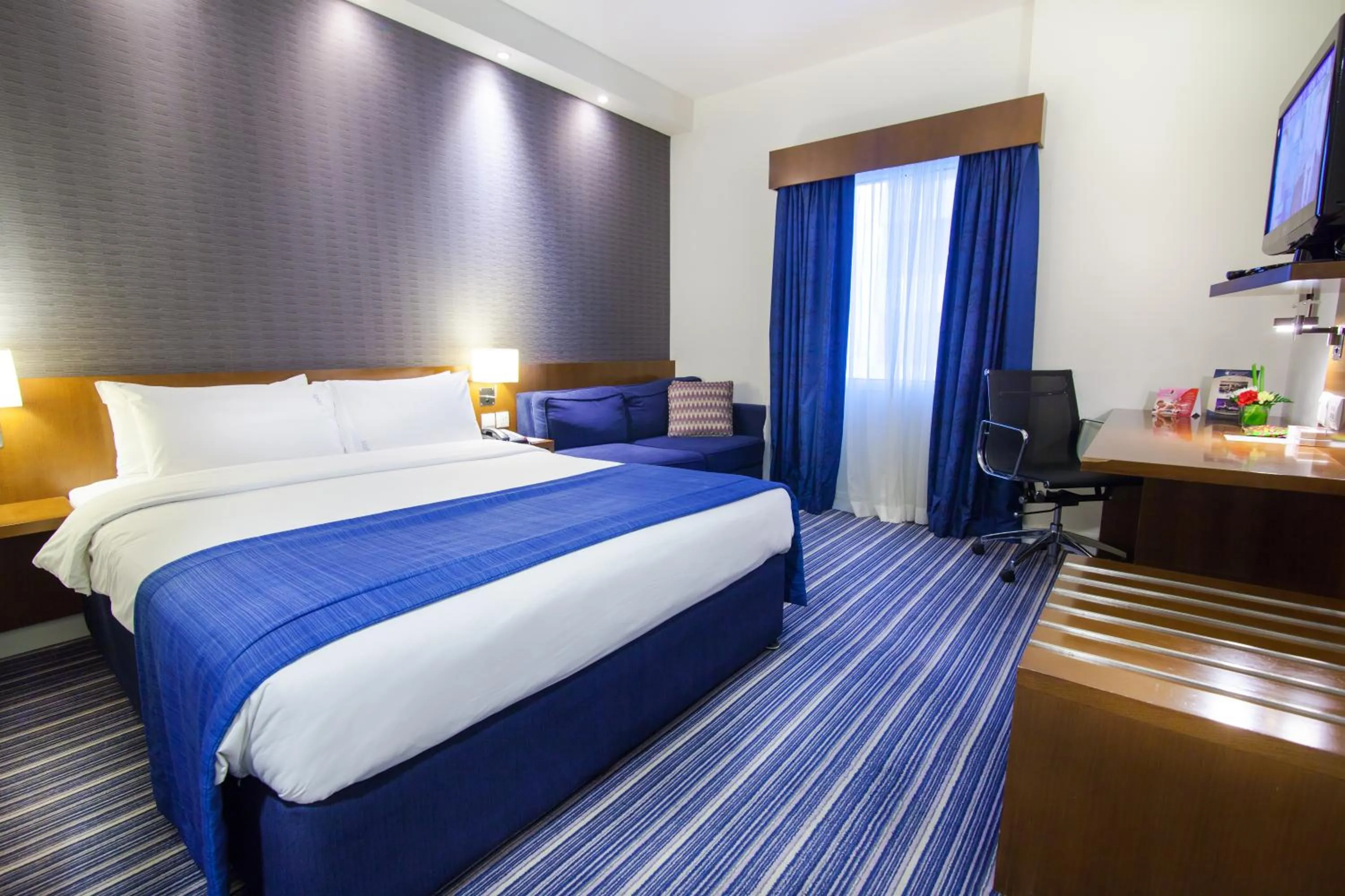 Bed in Holiday Bahrain Hotel