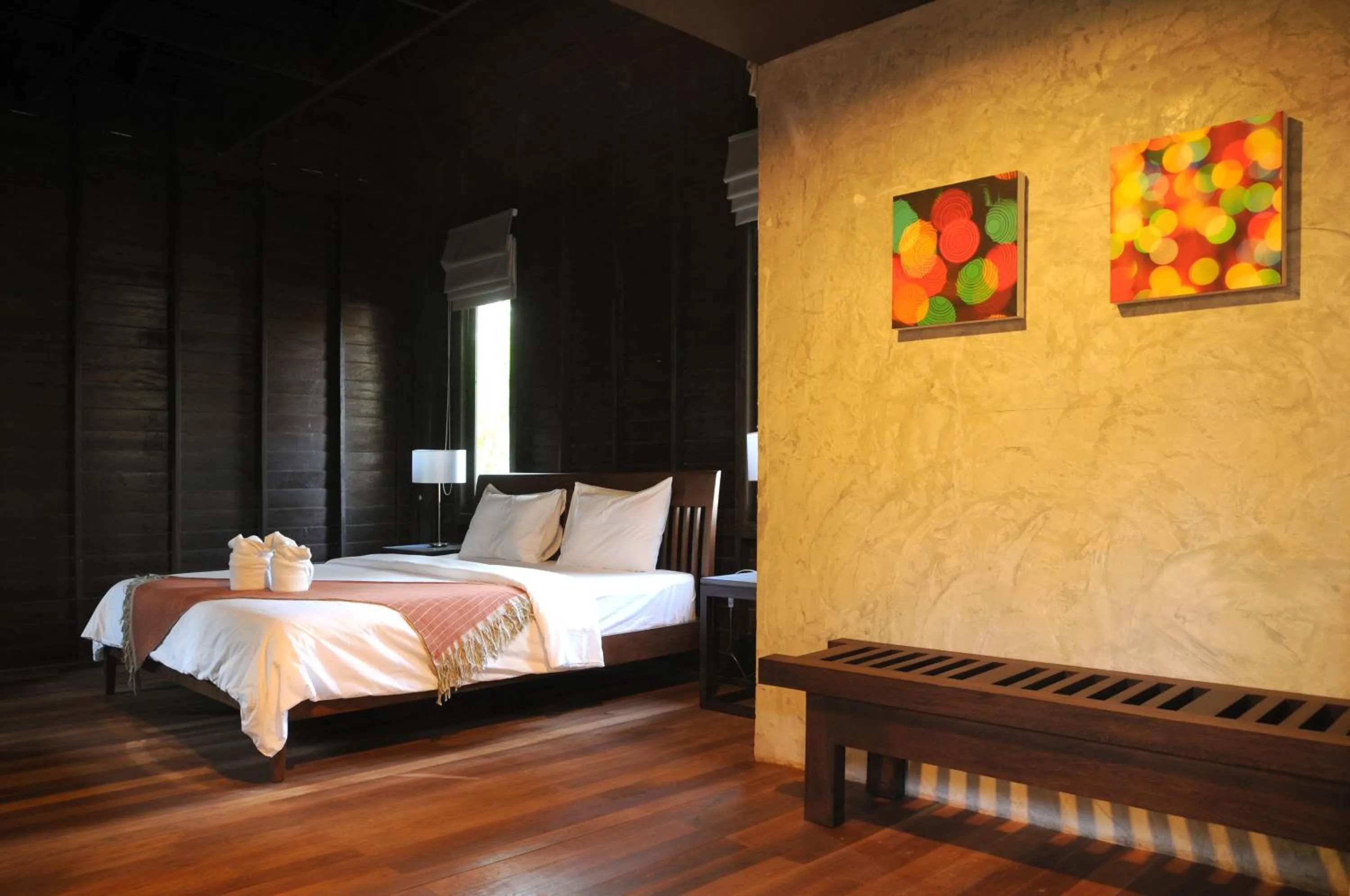 Bed in Baan Suan Ramita Resort