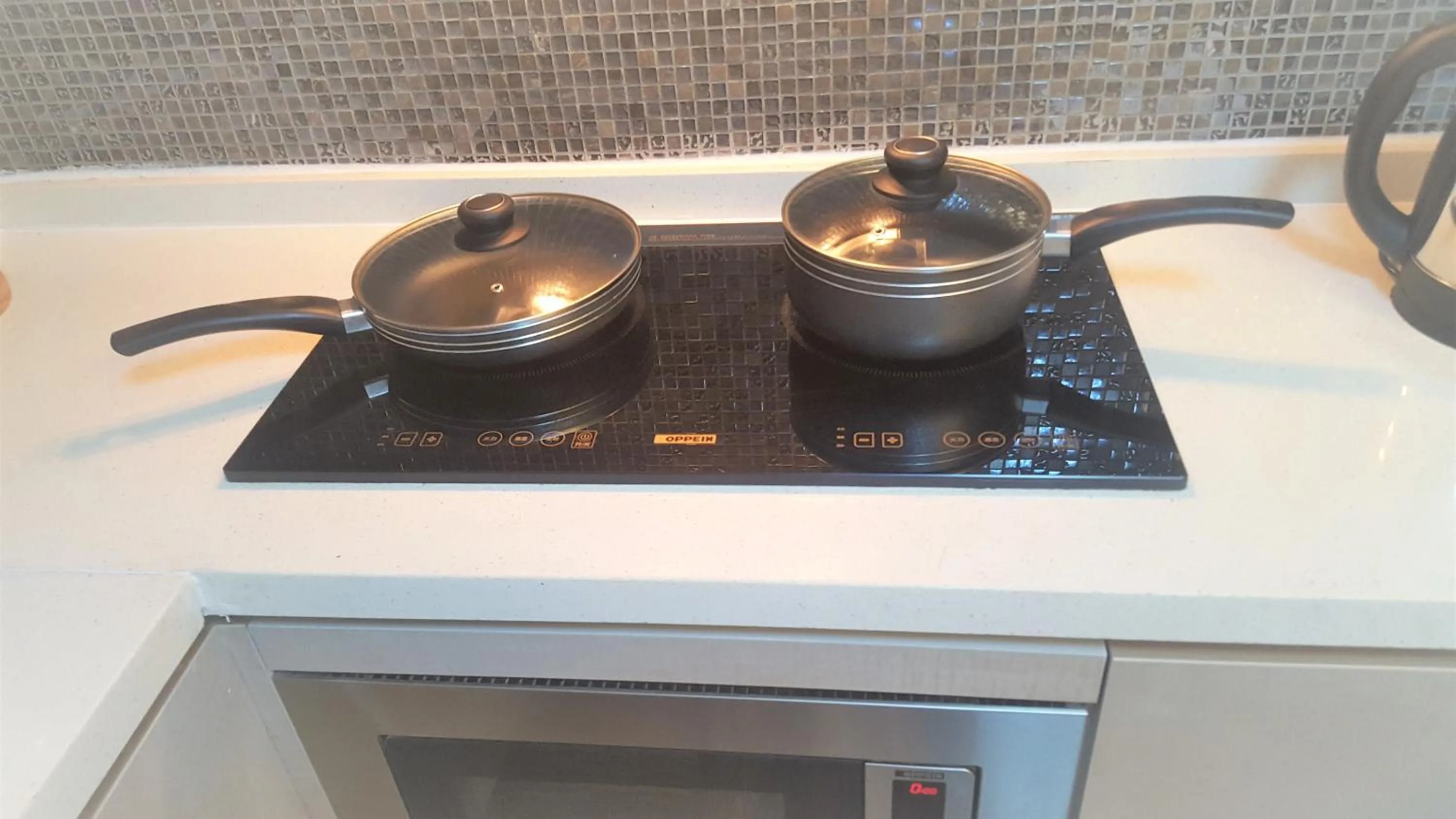 Kitchen or kitchenette in Coventina Lake Suites