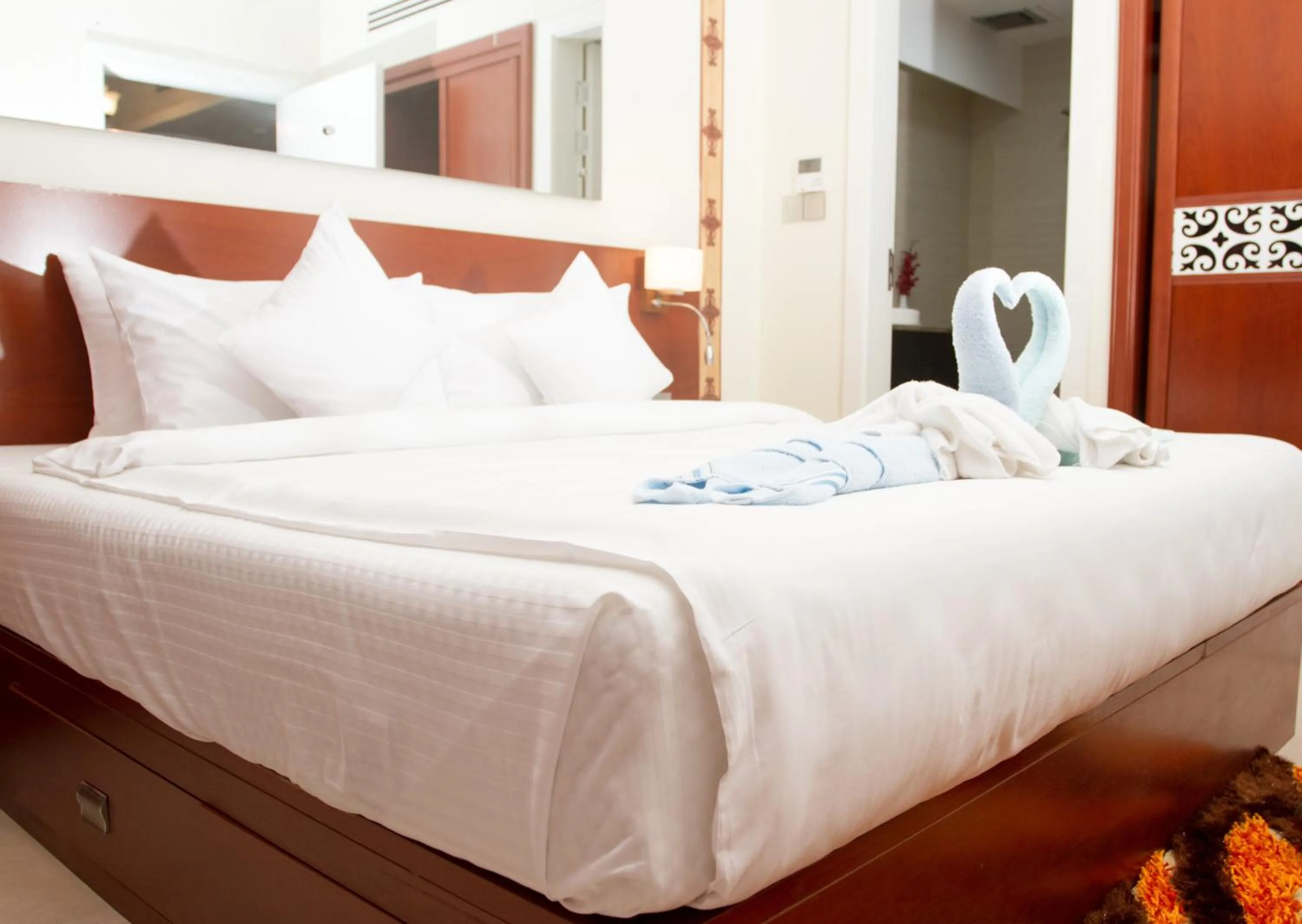 Bed in Coventina Lake Suites