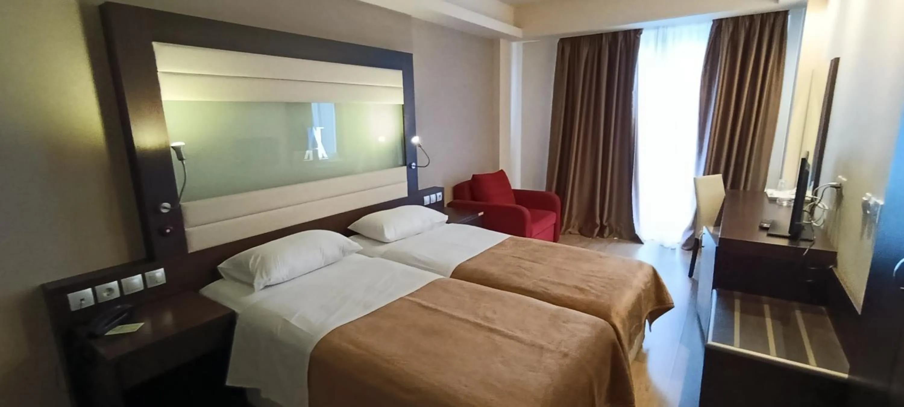 Bed in Arion Hotel