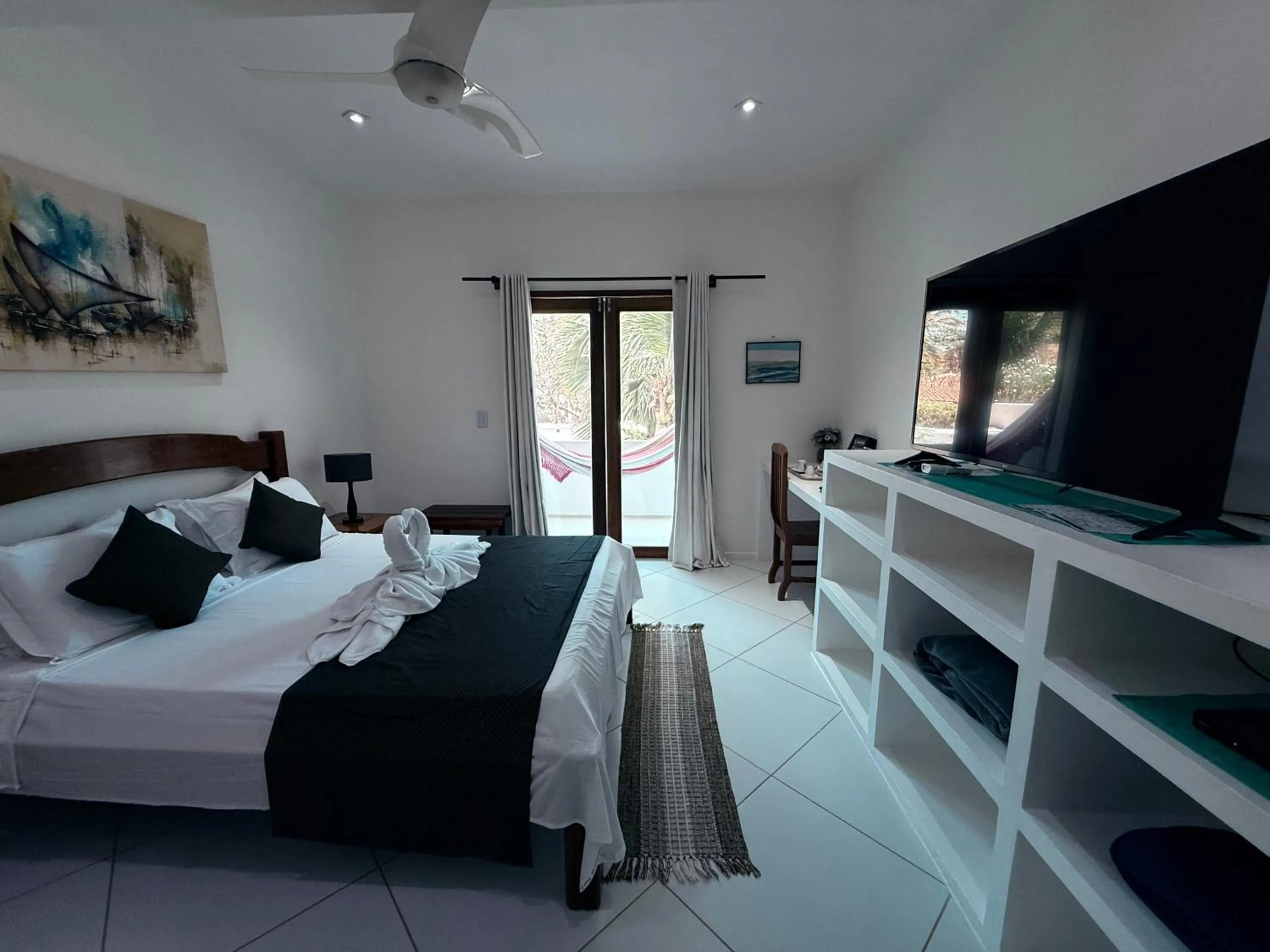 Bed in Pousada Caminho da Praia