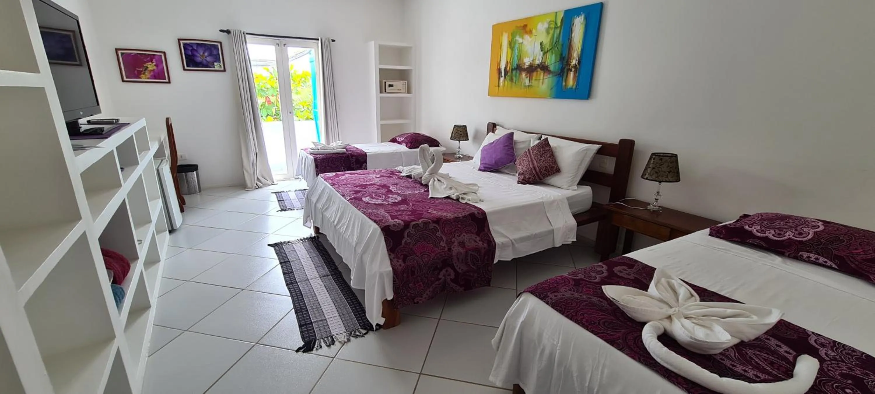 Bed in Pousada Caminho da Praia