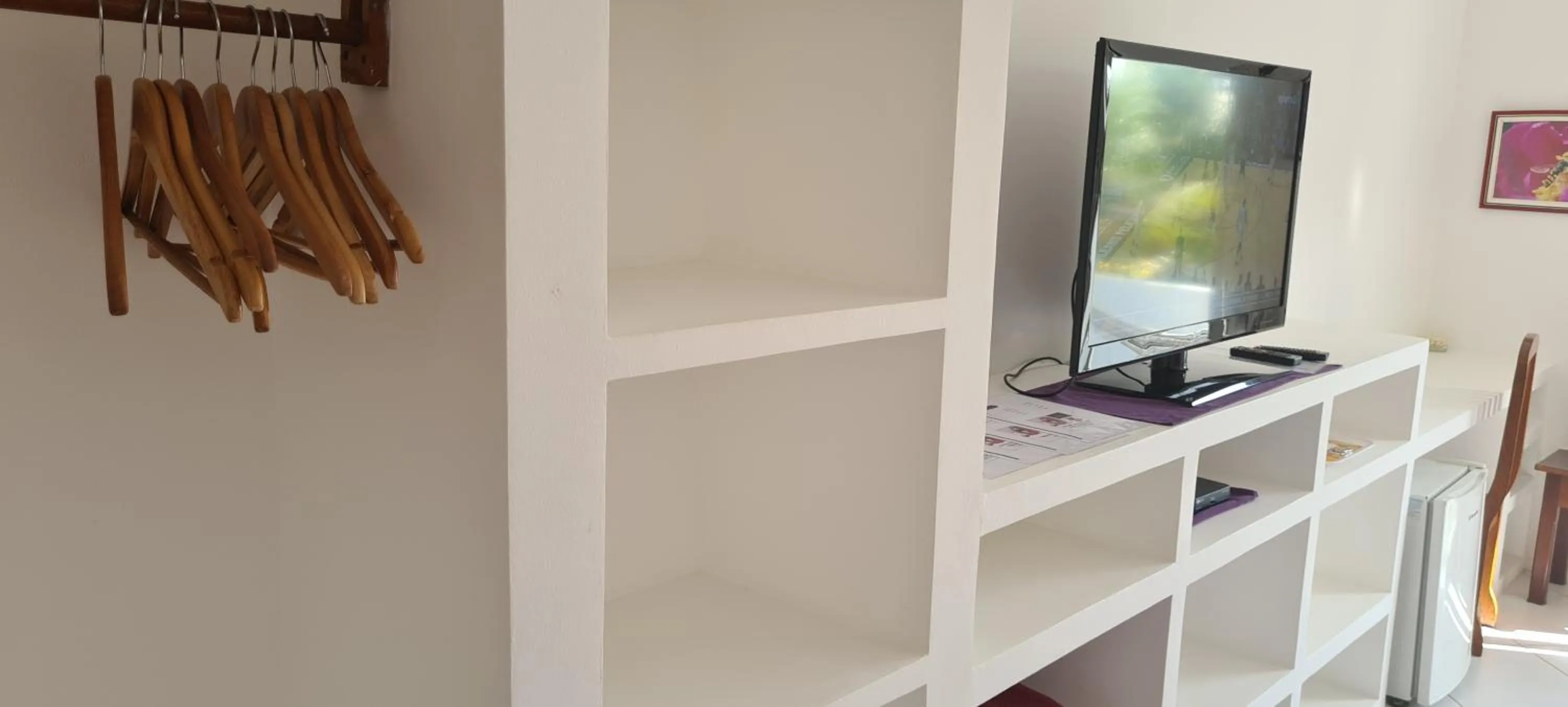 TV and multimedia in Pousada Caminho da Praia