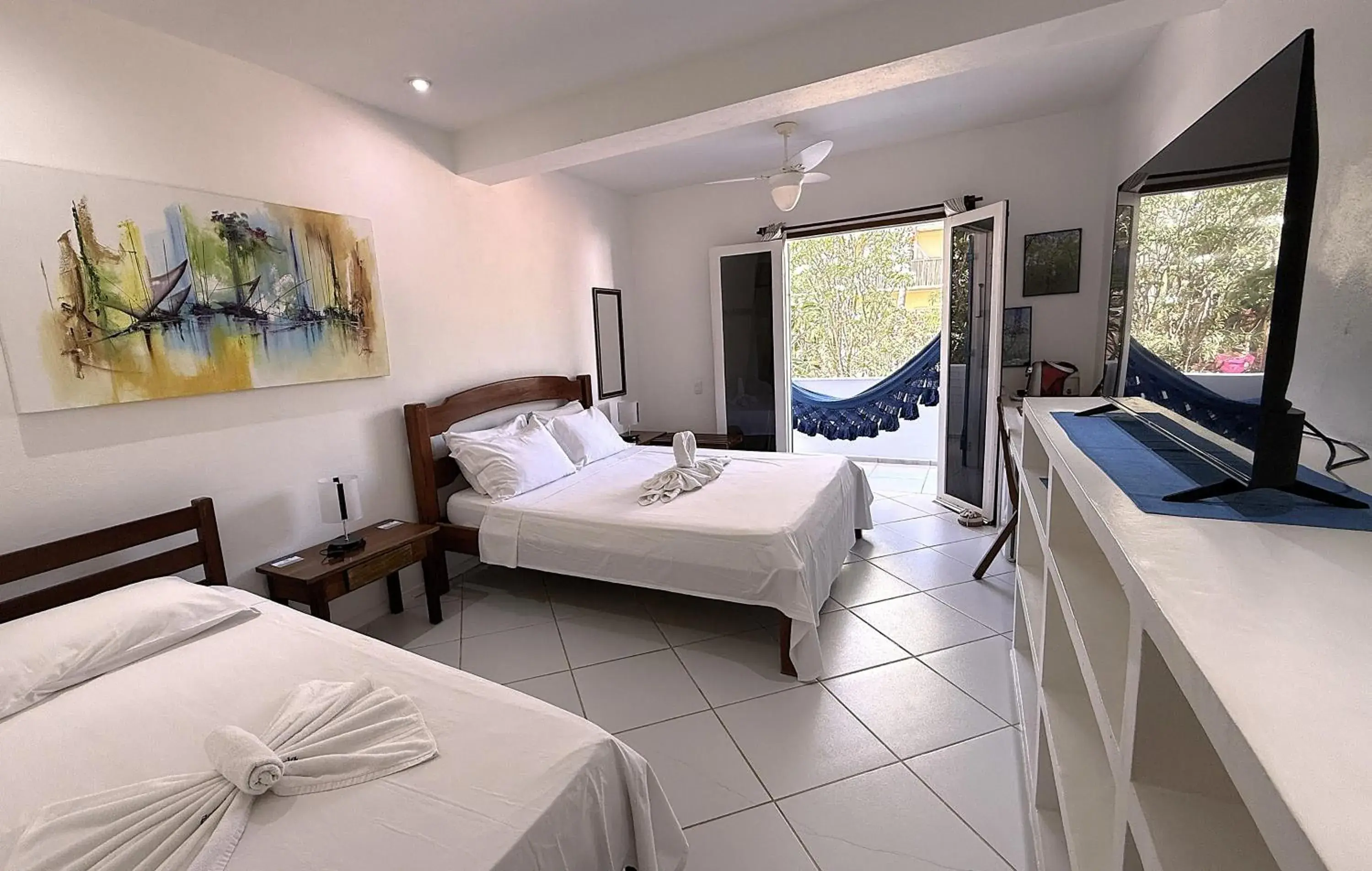 Deluxe Triple Room no Último Andar in Pousada Caminho da Praia Deluxe Triple Room no Último Andar in Pousada Caminho da Praia