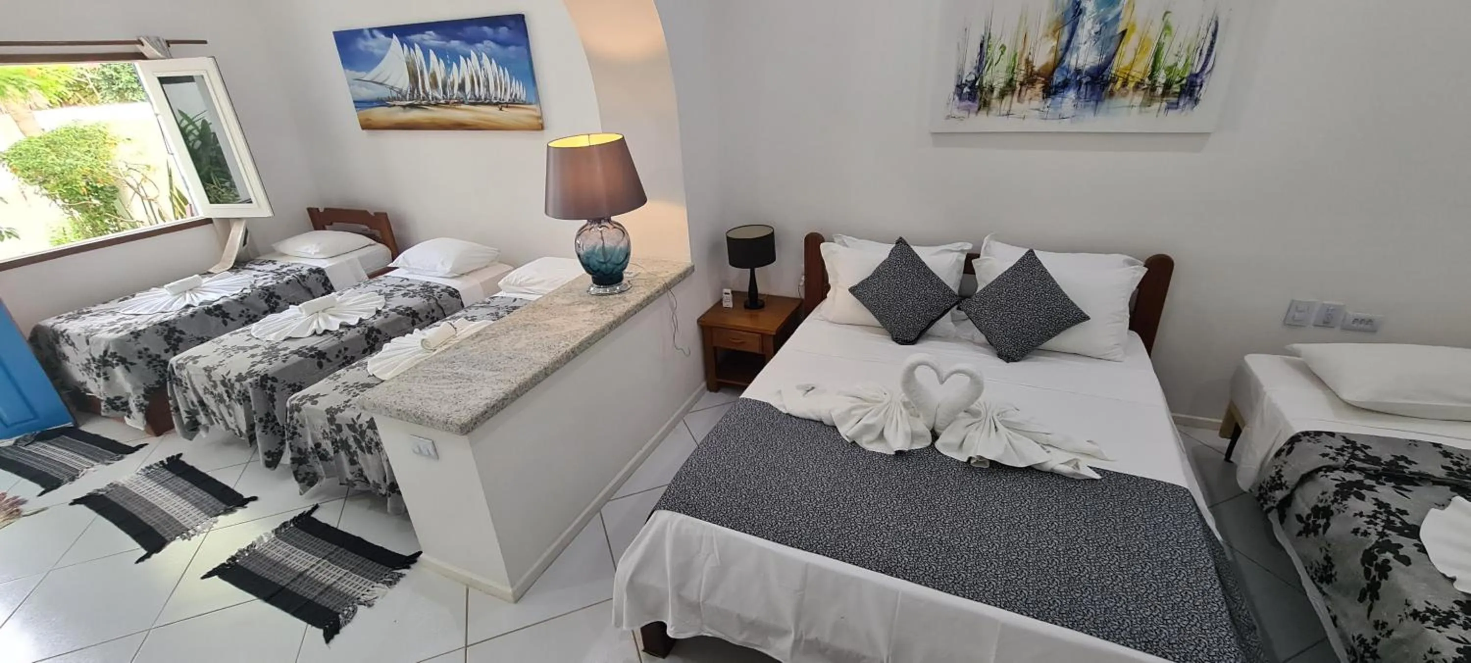 Bed in Pousada Caminho da Praia