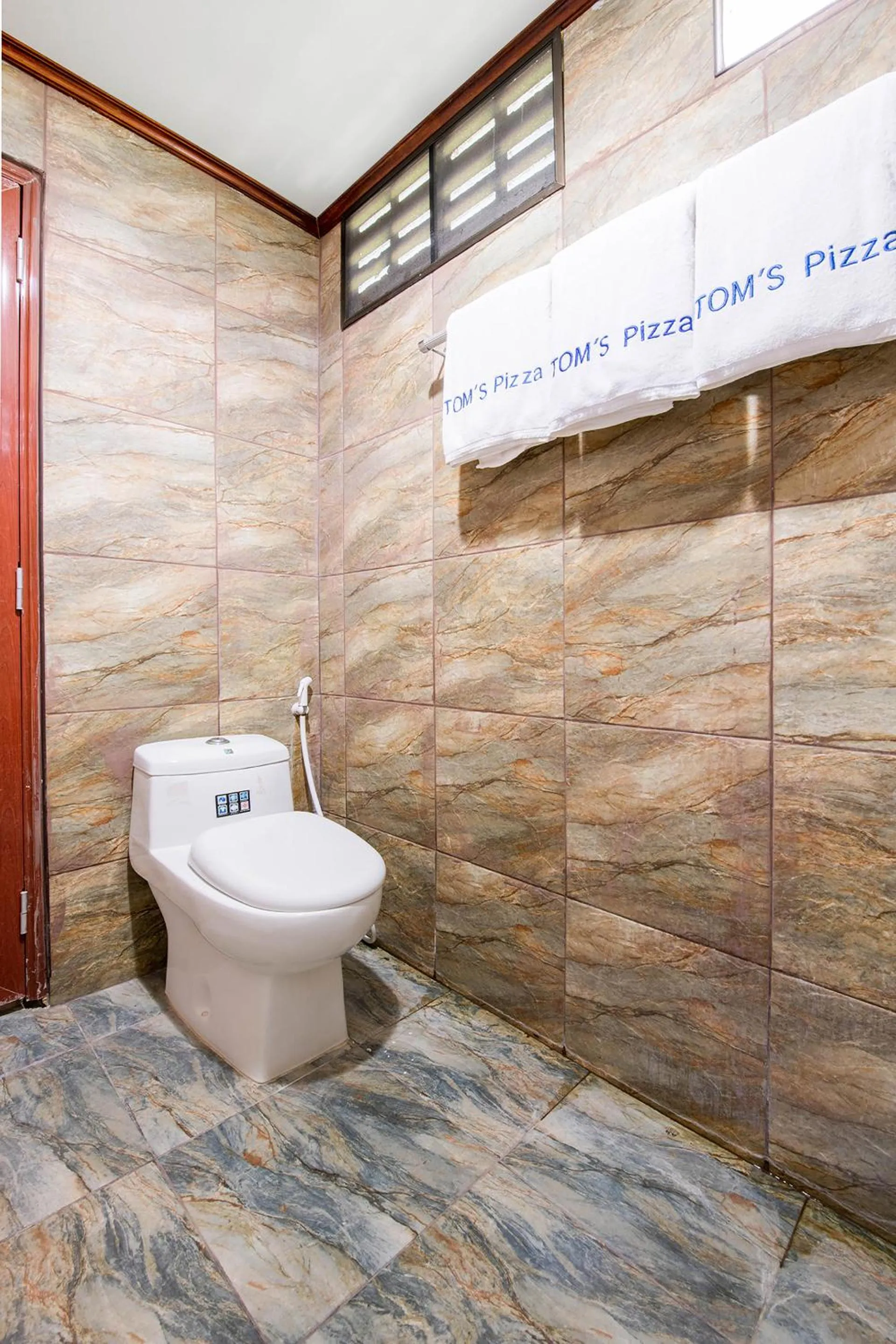 Bathroom in Tom Pizza Resort