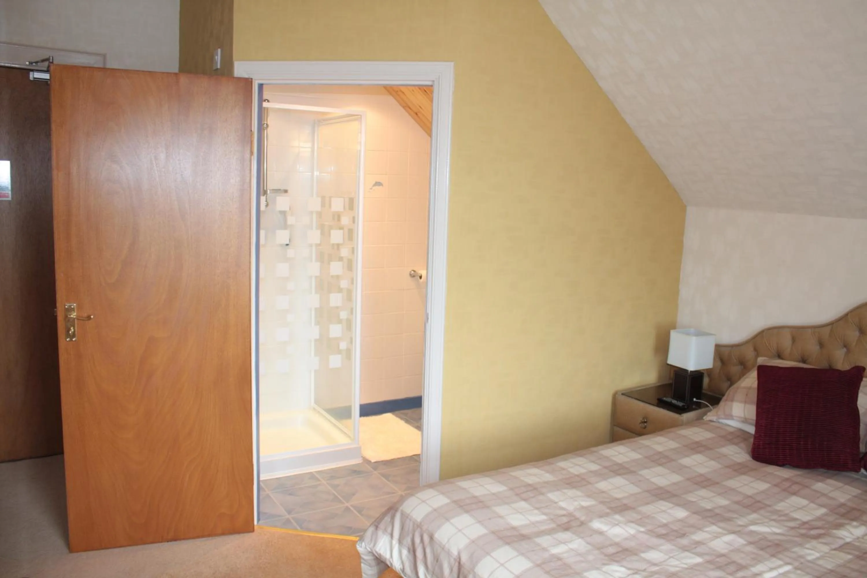 Decorative detail, Bed in Harbour House Bed & Breakfast - Wick