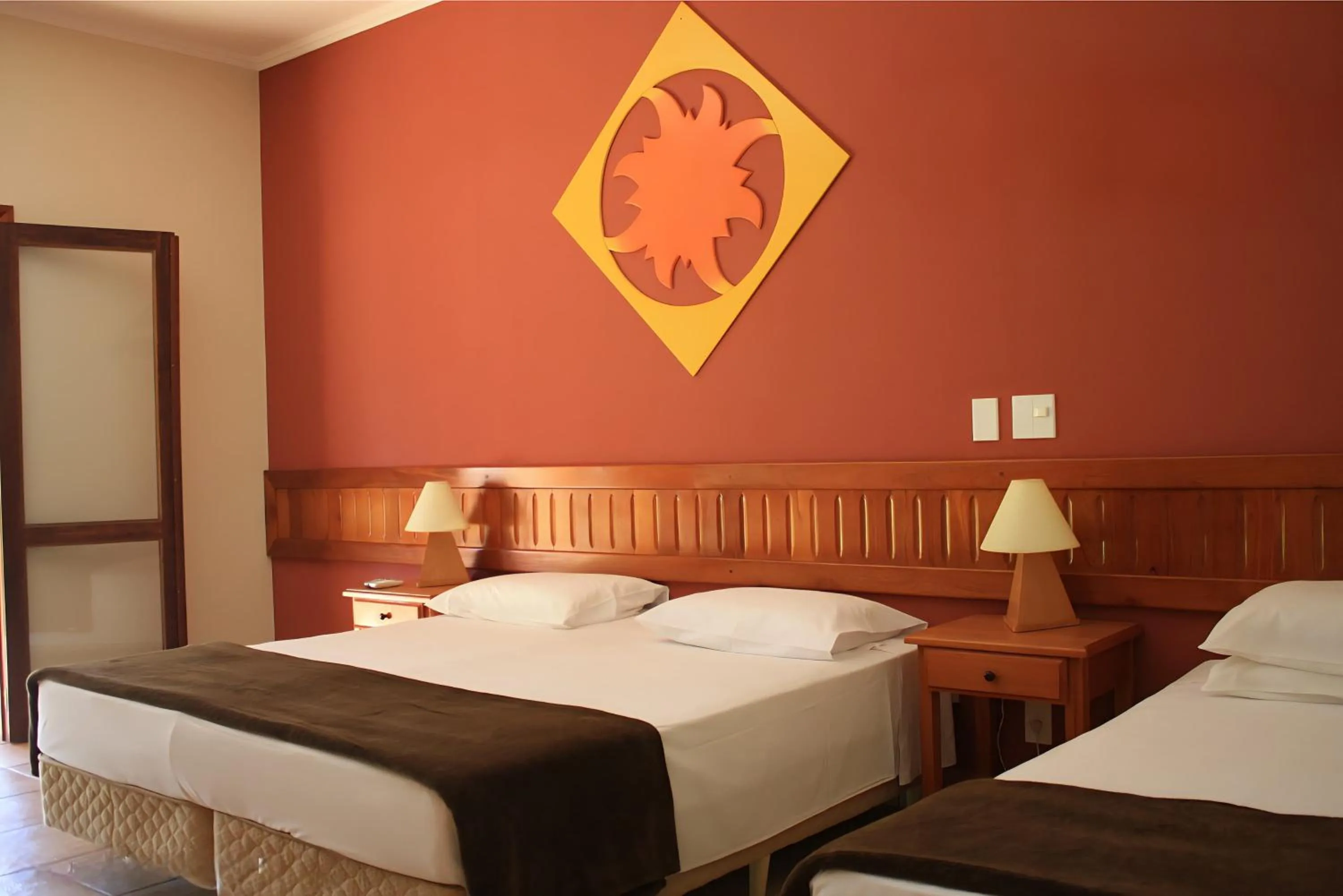 Standard Quadruple Room - single occupancy in Hotel Pousada Brilho do Sol