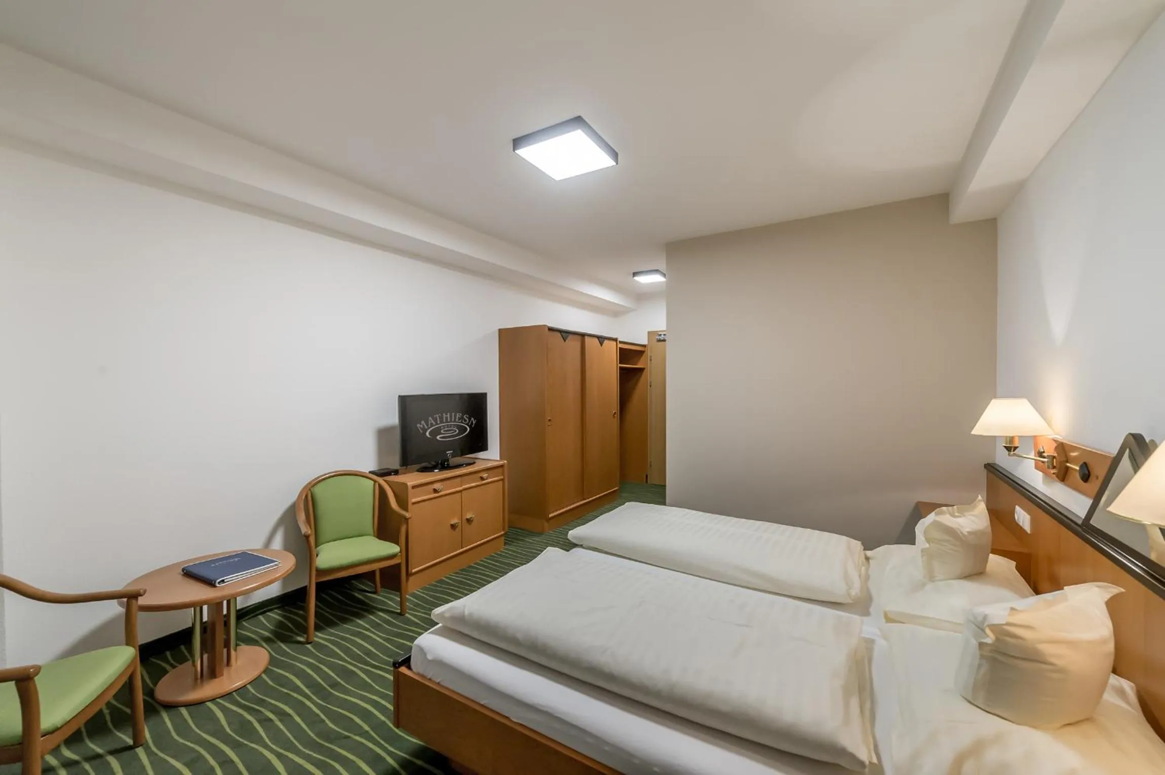 Photo of the whole room, Bed in Hotel Mathiesn