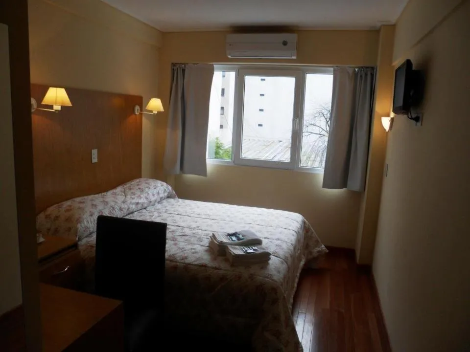 Photo of the whole room, Bed in Hotel Juramento