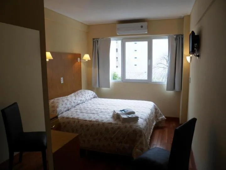 Photo of the whole room, Bed in Hotel Juramento