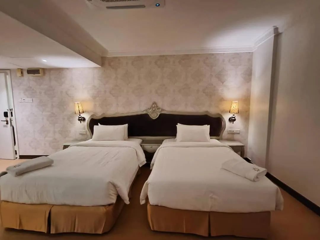 Bed in RC Hotel Melaka