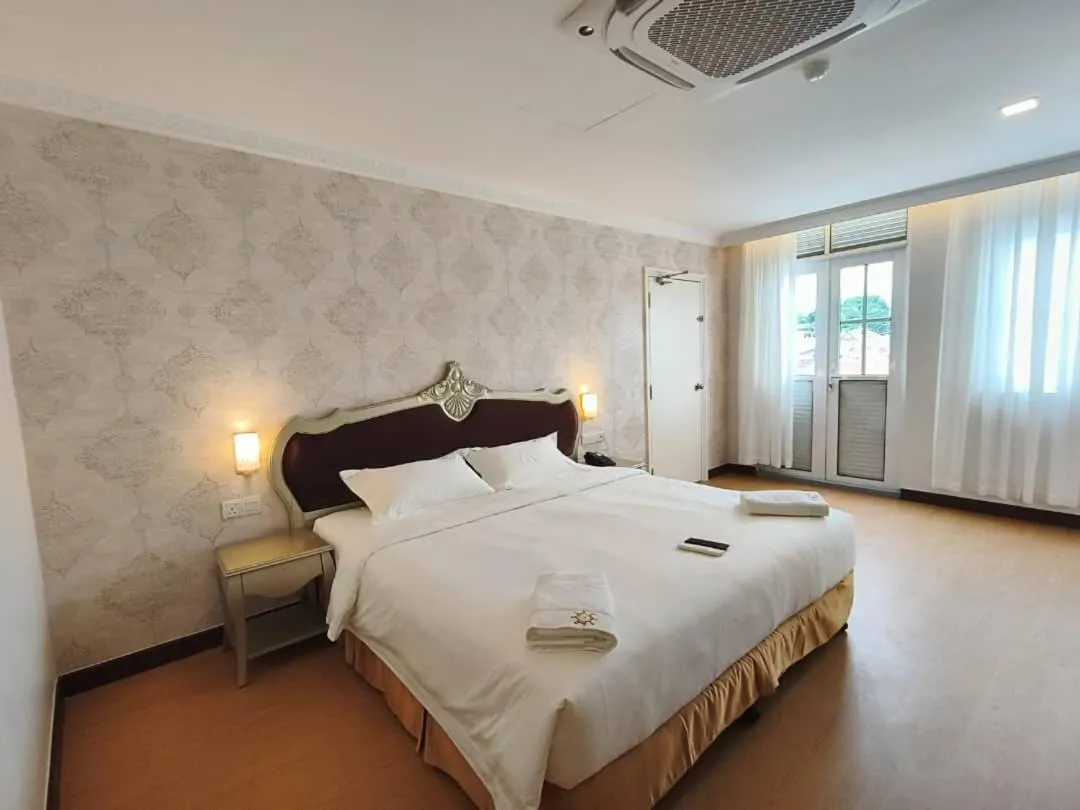Bed in RC Hotel Melaka