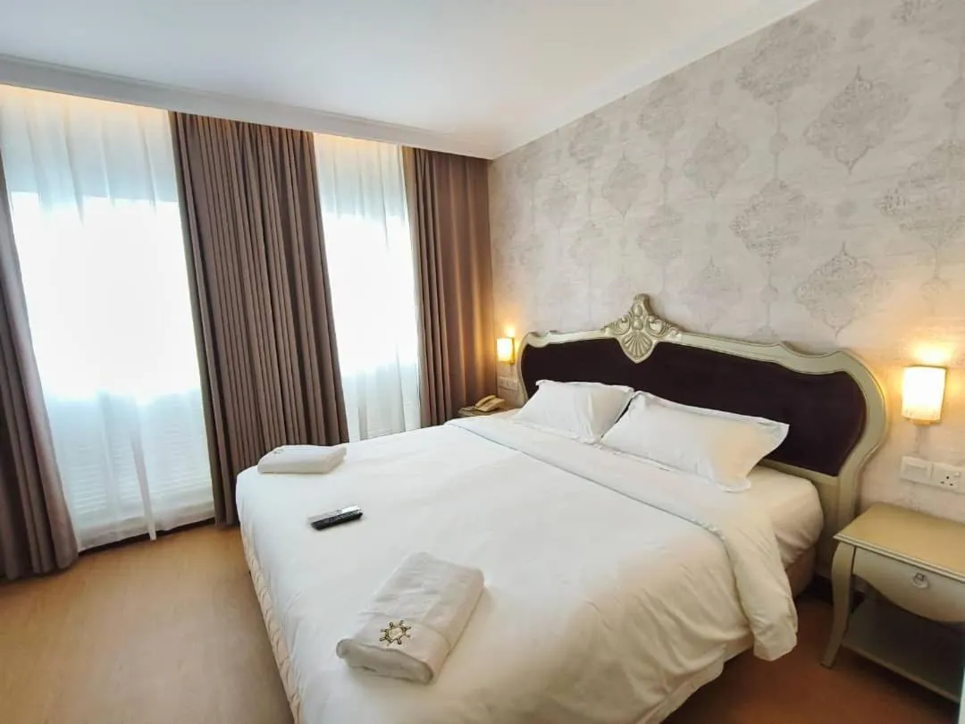 Bed in RC Hotel Melaka