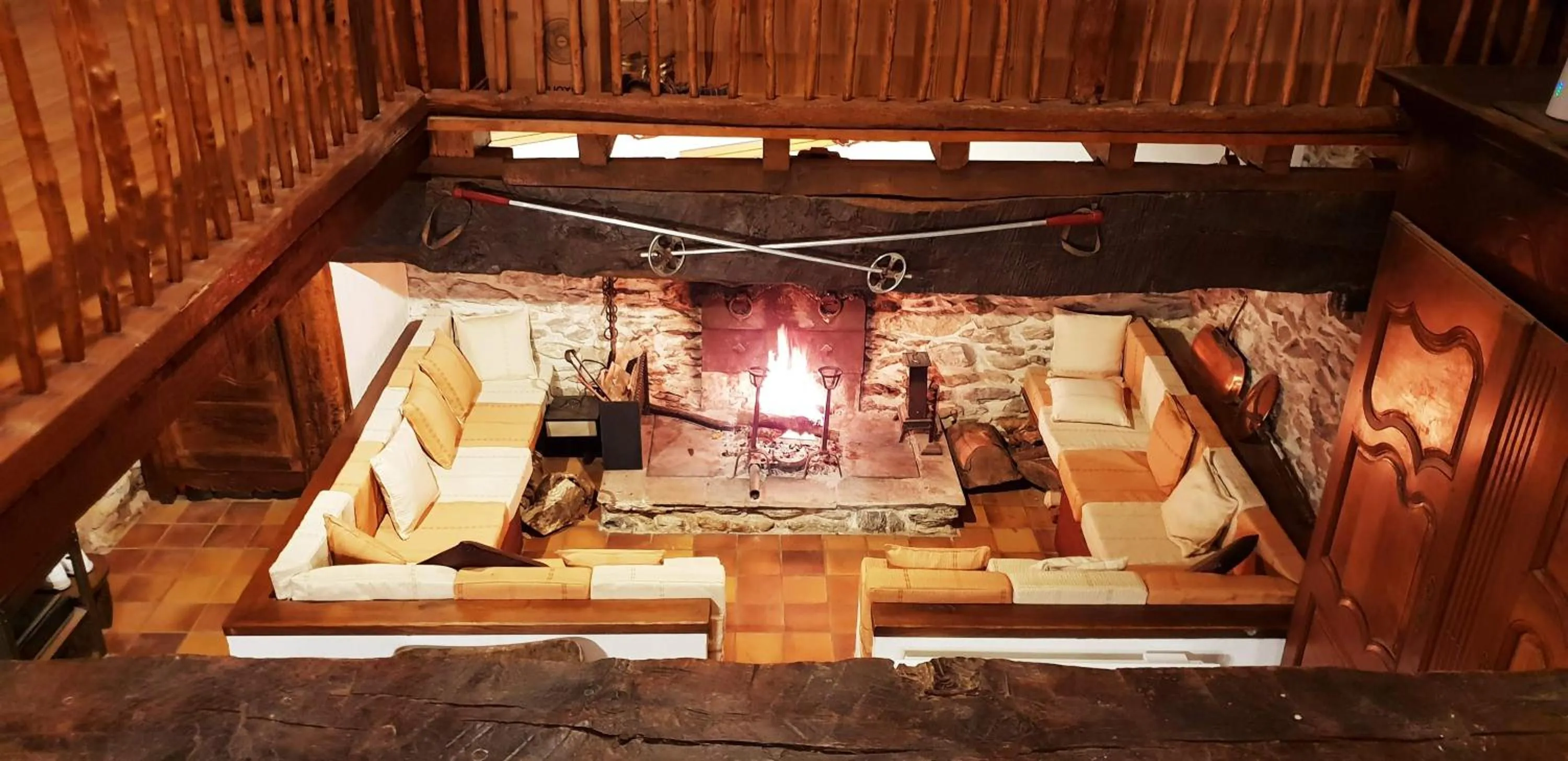 Communal lounge/ TV room in La Bergerie de Louvie