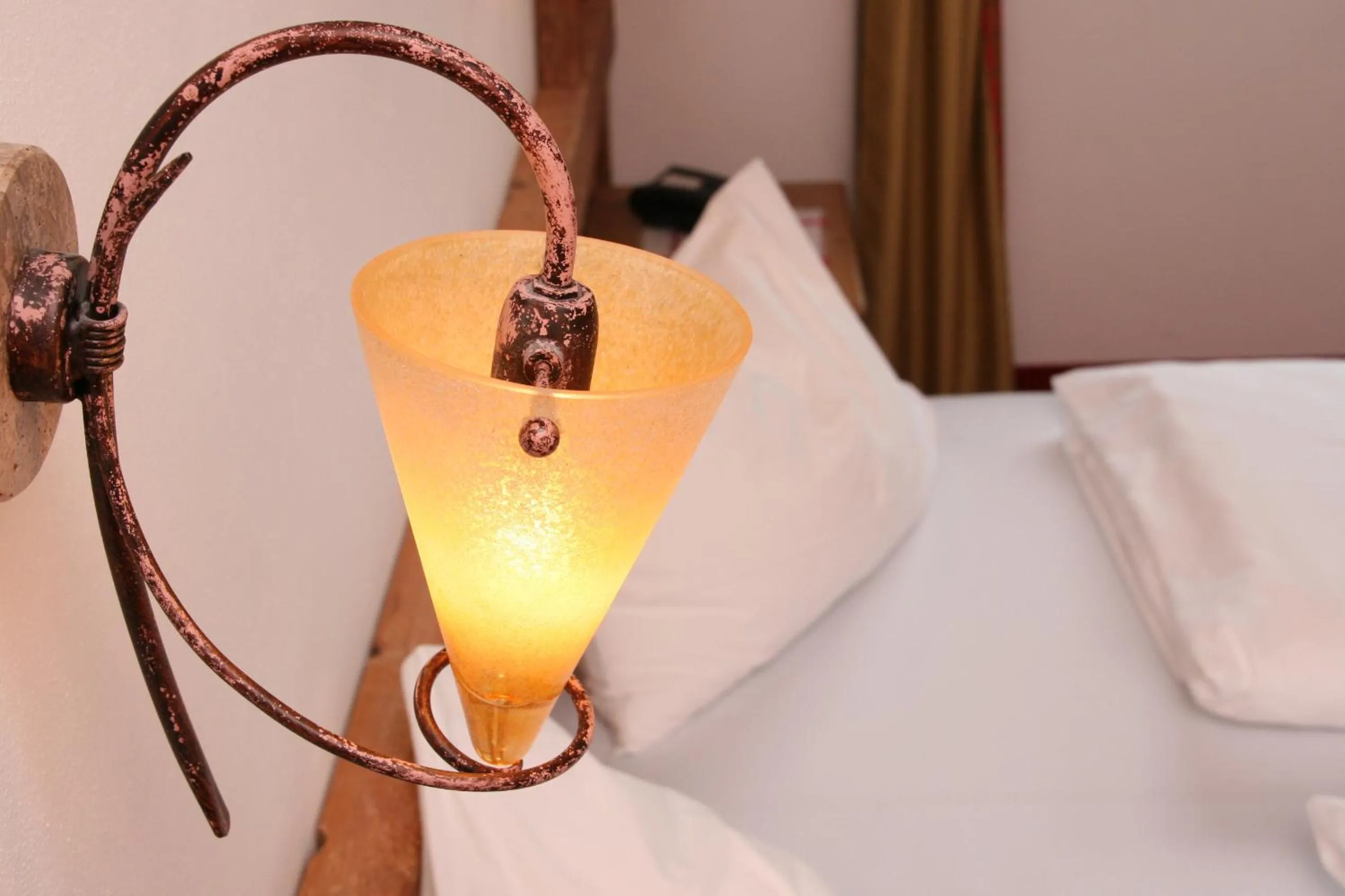 Decorative detail, Bed in Hotel Garni Elisir