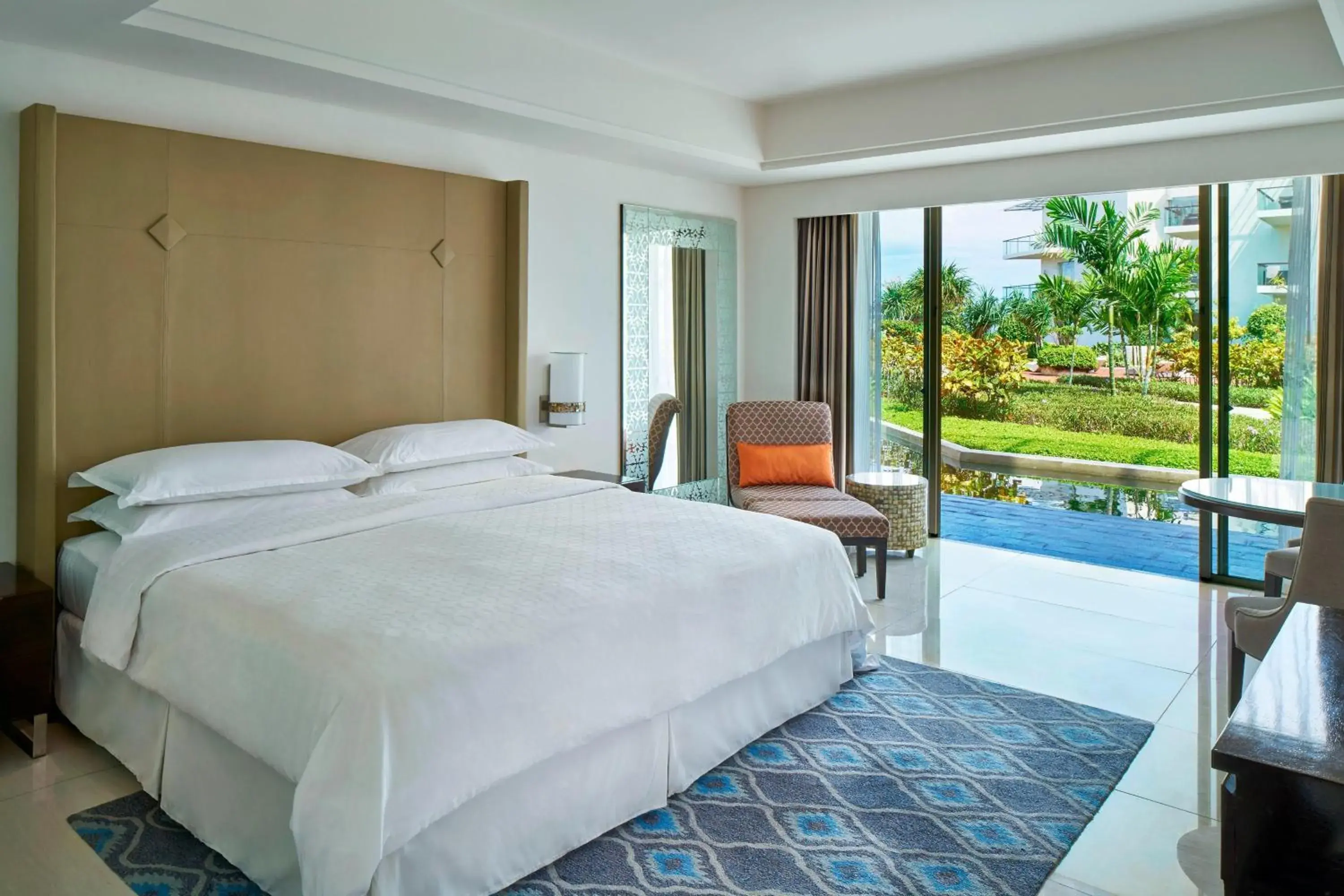 Guest Room Garden View, 1 King Bed (suitable for 2 adults & 2 children below 12 y.o. or 3 adults with Extra Bed) in Sheraton Bali Kuta Resort Guest Room Garden View, 1 King Bed (suitable for 2 adults & 2 children below 12 y.o. or 3 adults with Extra Bed) in Sheraton Bali Kuta Resort