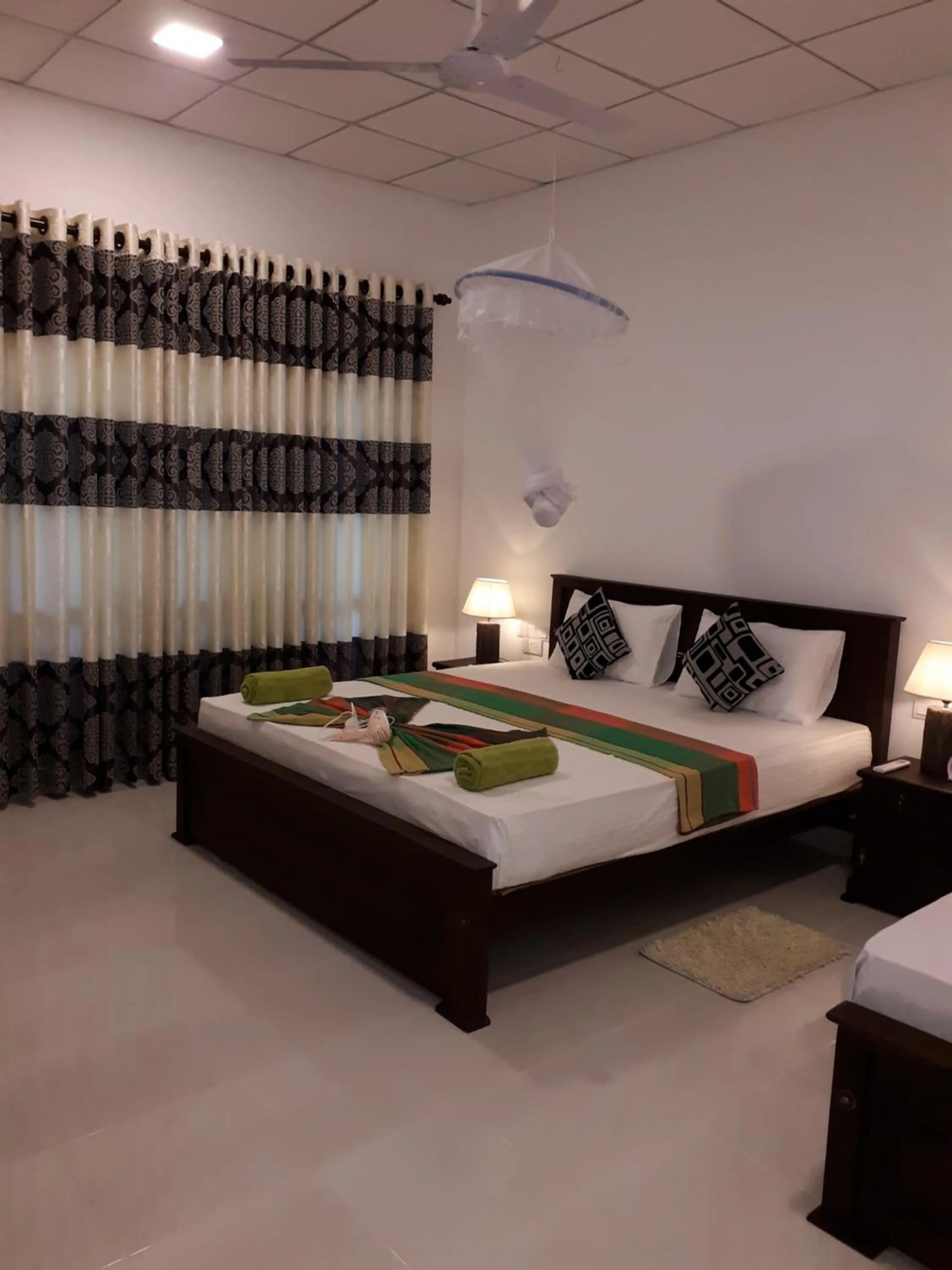 Bed in Sigiri Hibiscus Villa