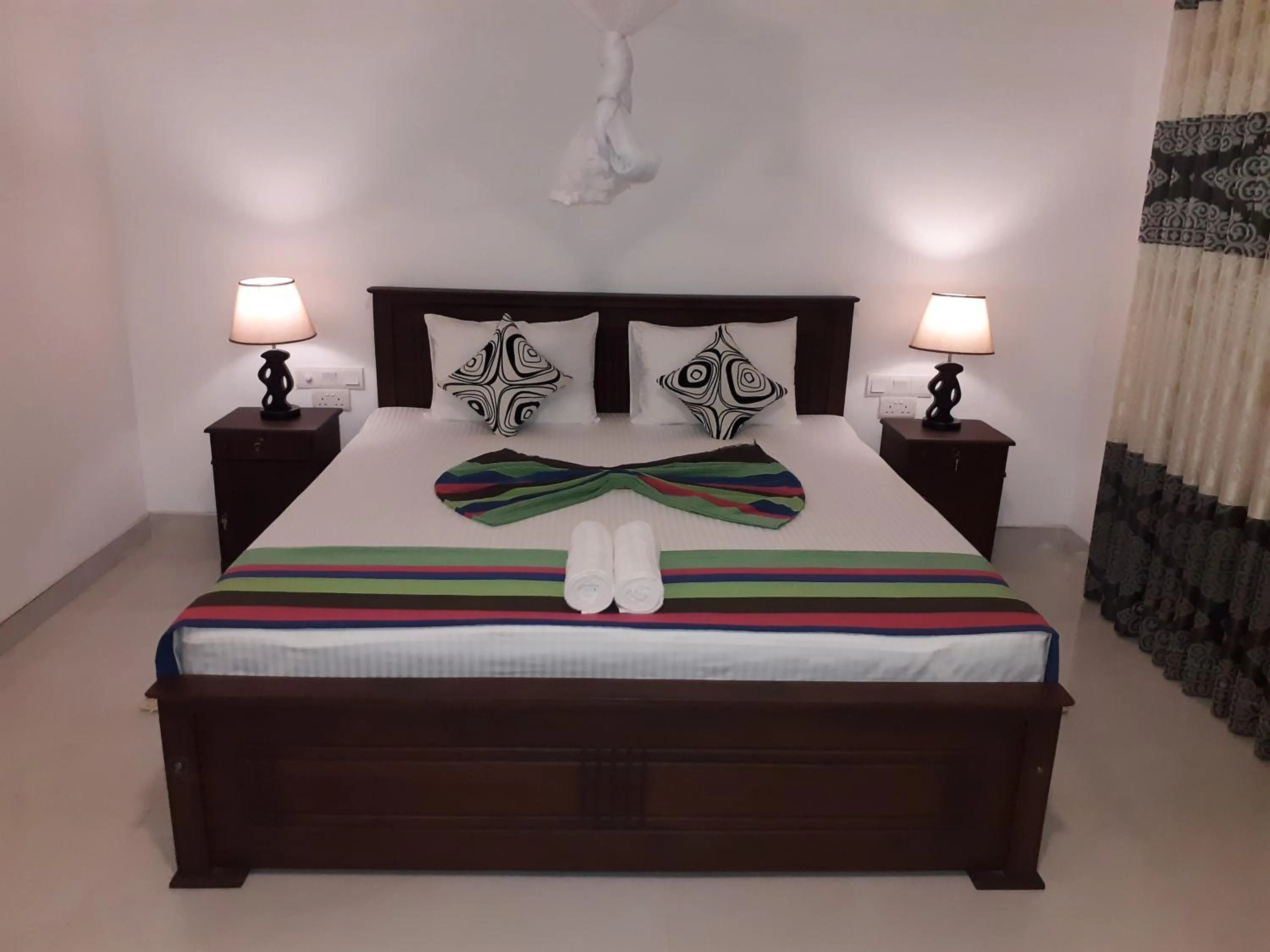 Bed in Sigiri Hibiscus Villa