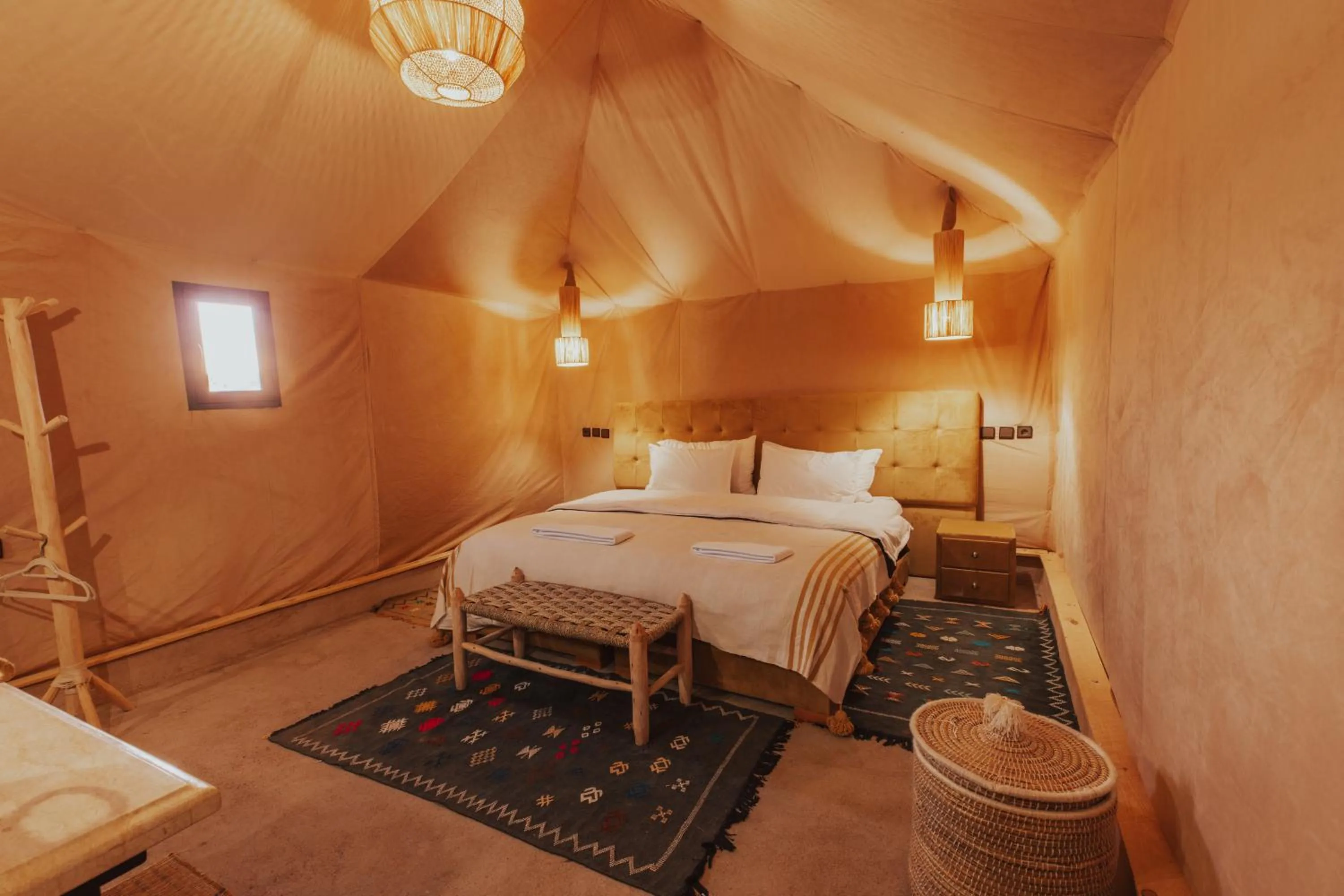Bed in Tassili Luxury Desert Camp