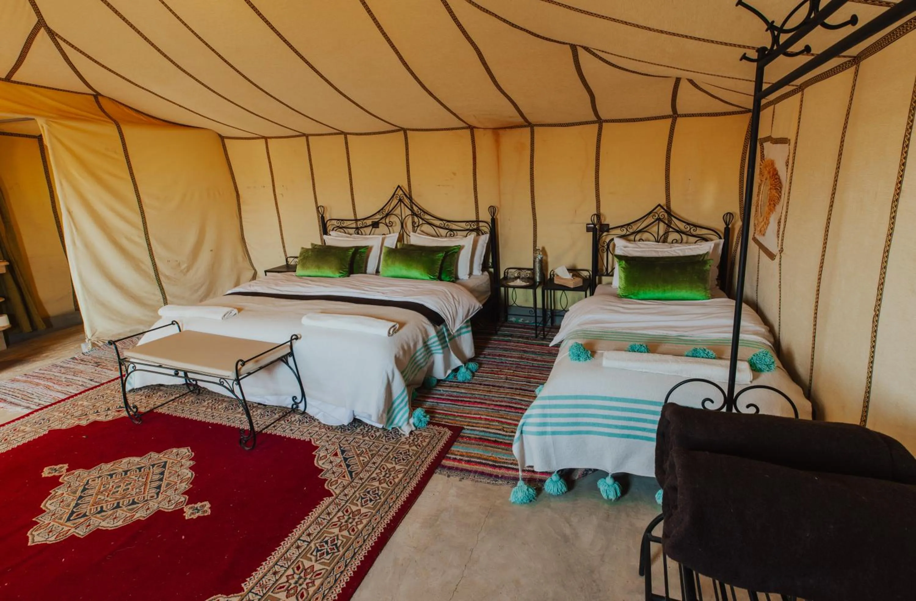 Bed in Tassili Luxury Desert Camp