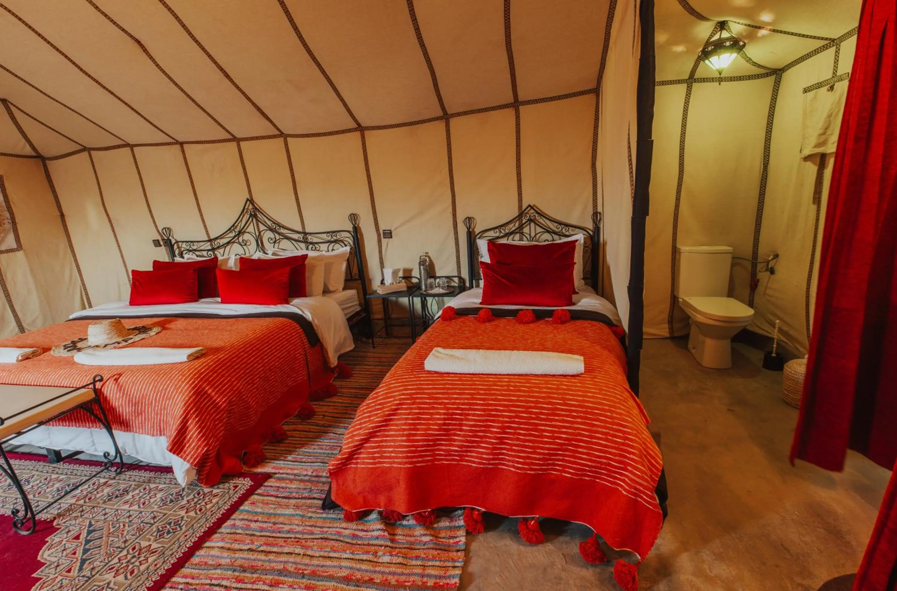 Bed in Tassili Luxury Desert Camp