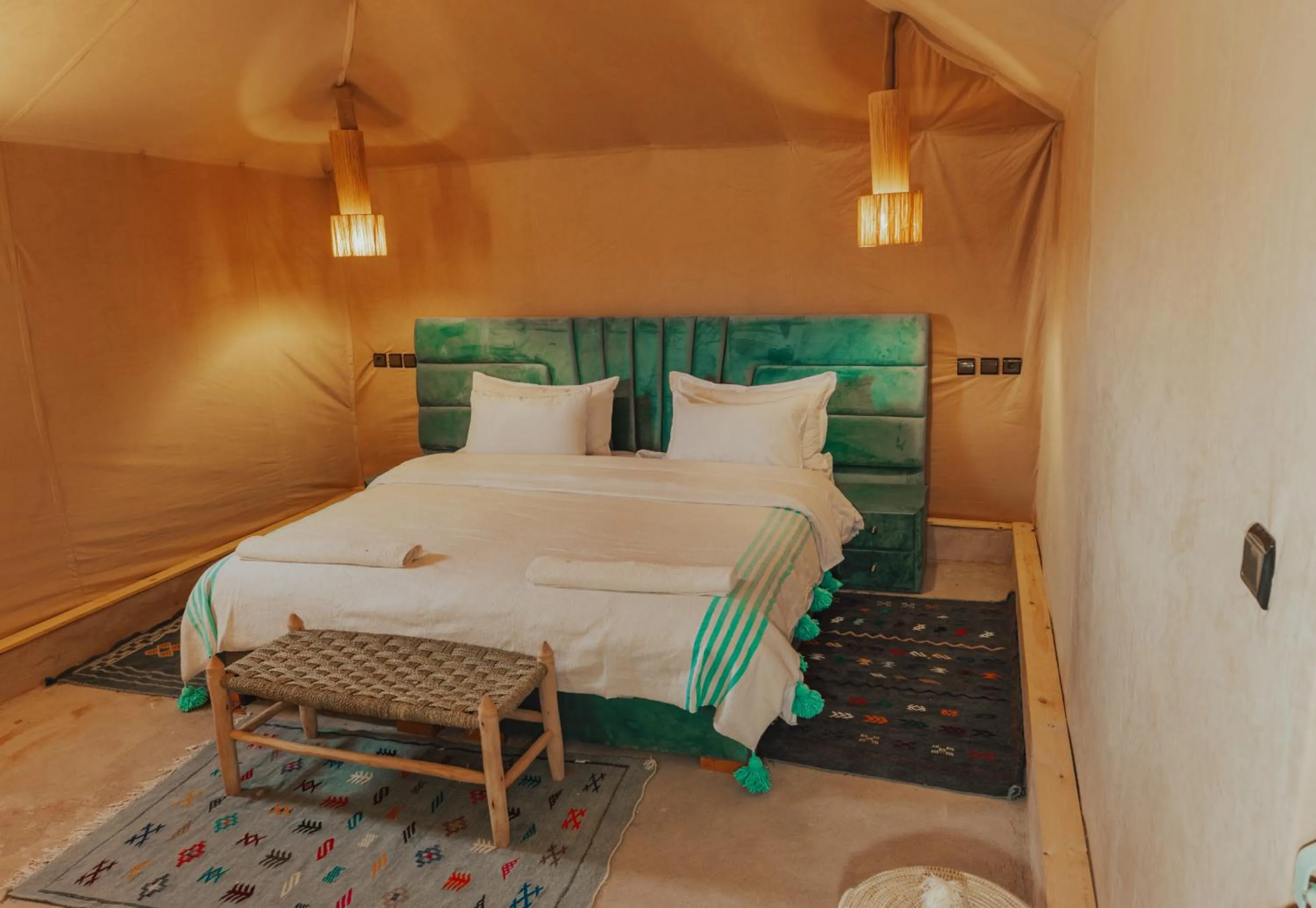 Bed in Tassili Luxury Desert Camp